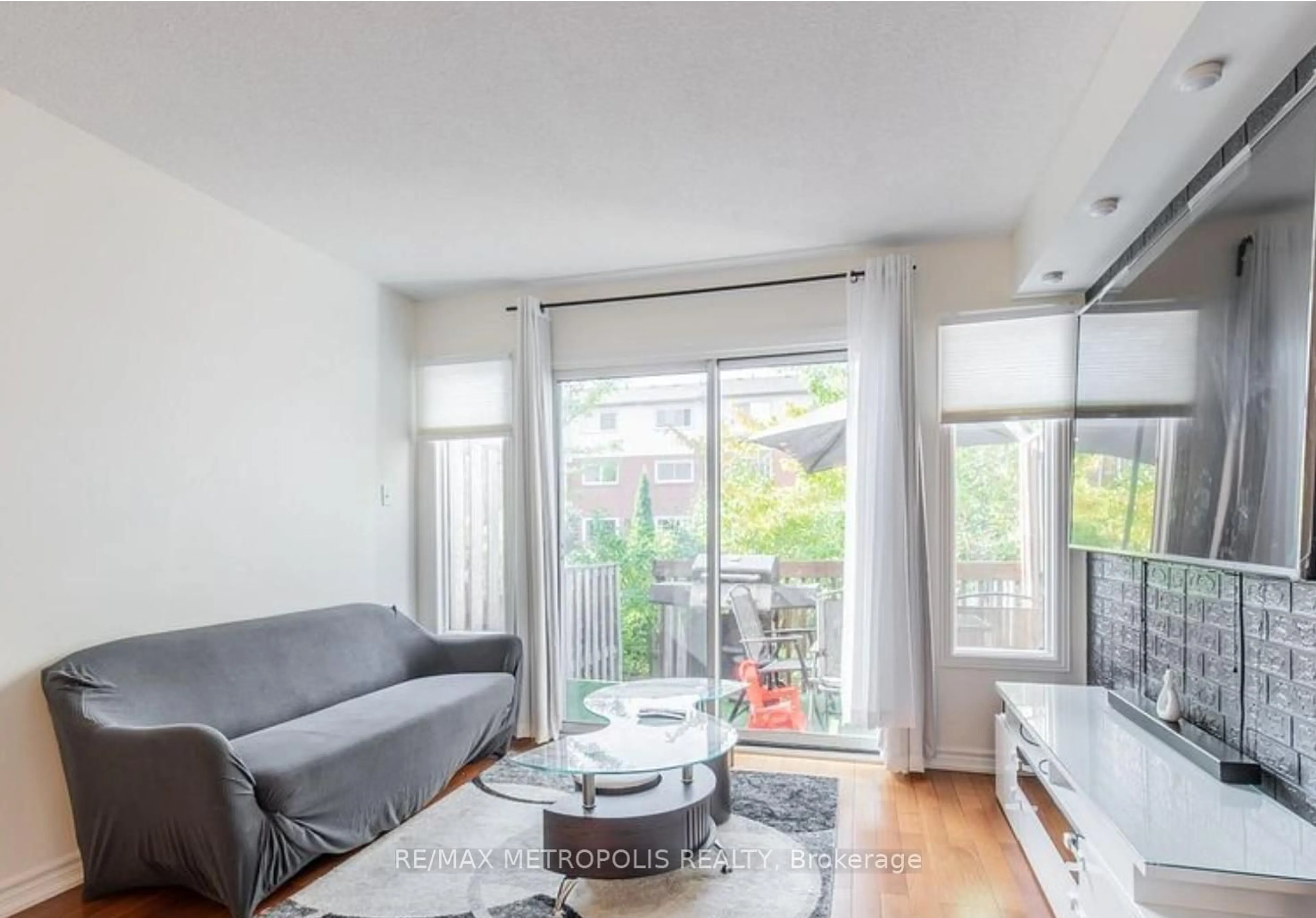 Living room with furniture, unknown for 3895 Doug Leavens Blvd #39, Mississauga Ontario L5N 7G1