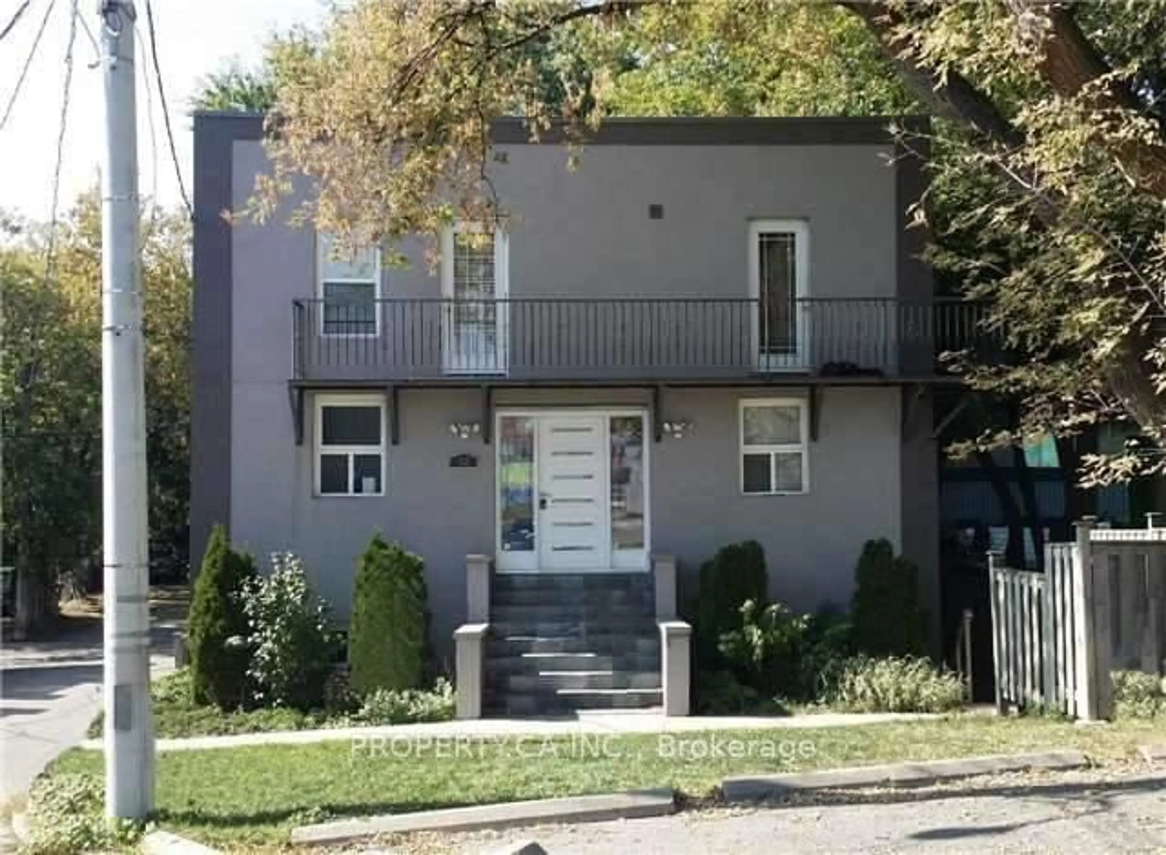 Home with brick exterior material, street for 22 Brad St, Toronto Ontario M6P 1N1