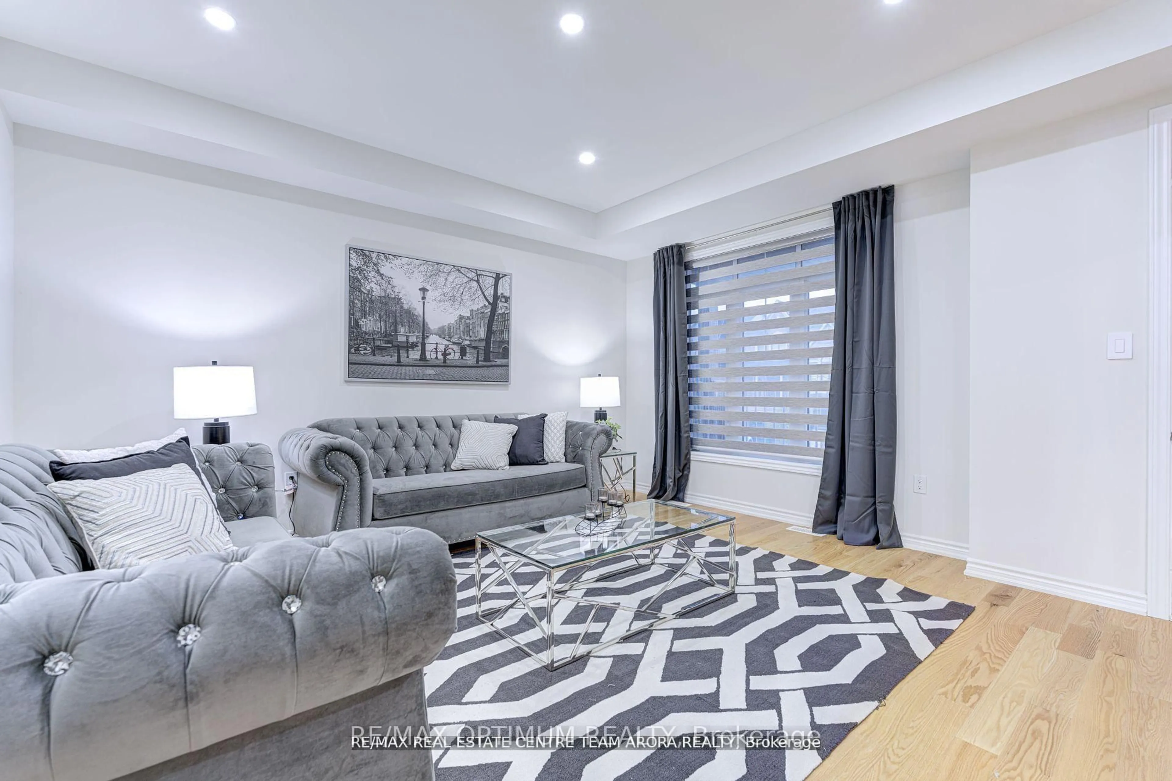 Living room with furniture, unknown for 566 Queen Mary Dr, Brampton Ontario L7A 4Y6