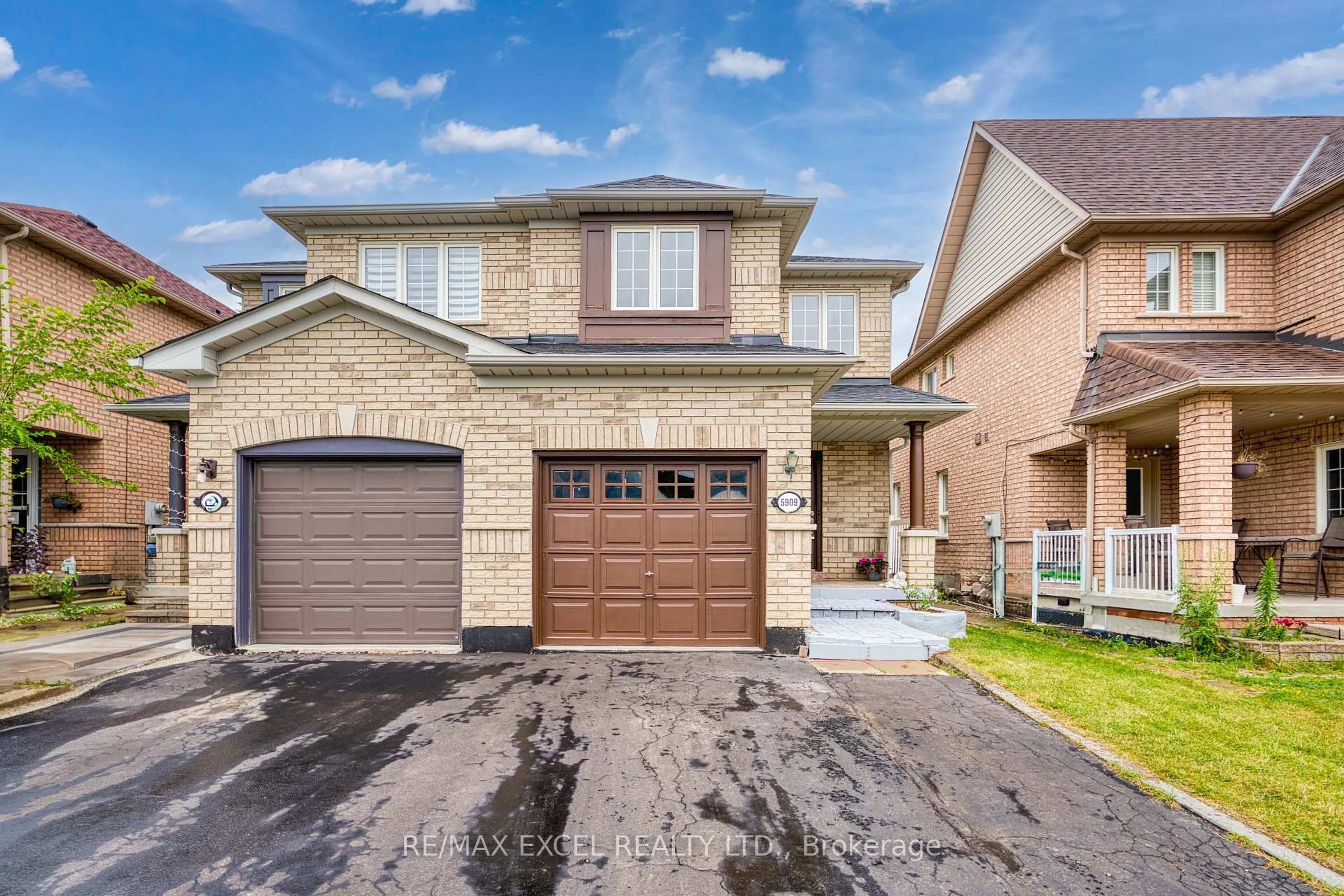 Home with brick exterior material, street for 5909 Churchill Meadows Blvd, Mississauga Ontario L5M 6Y2