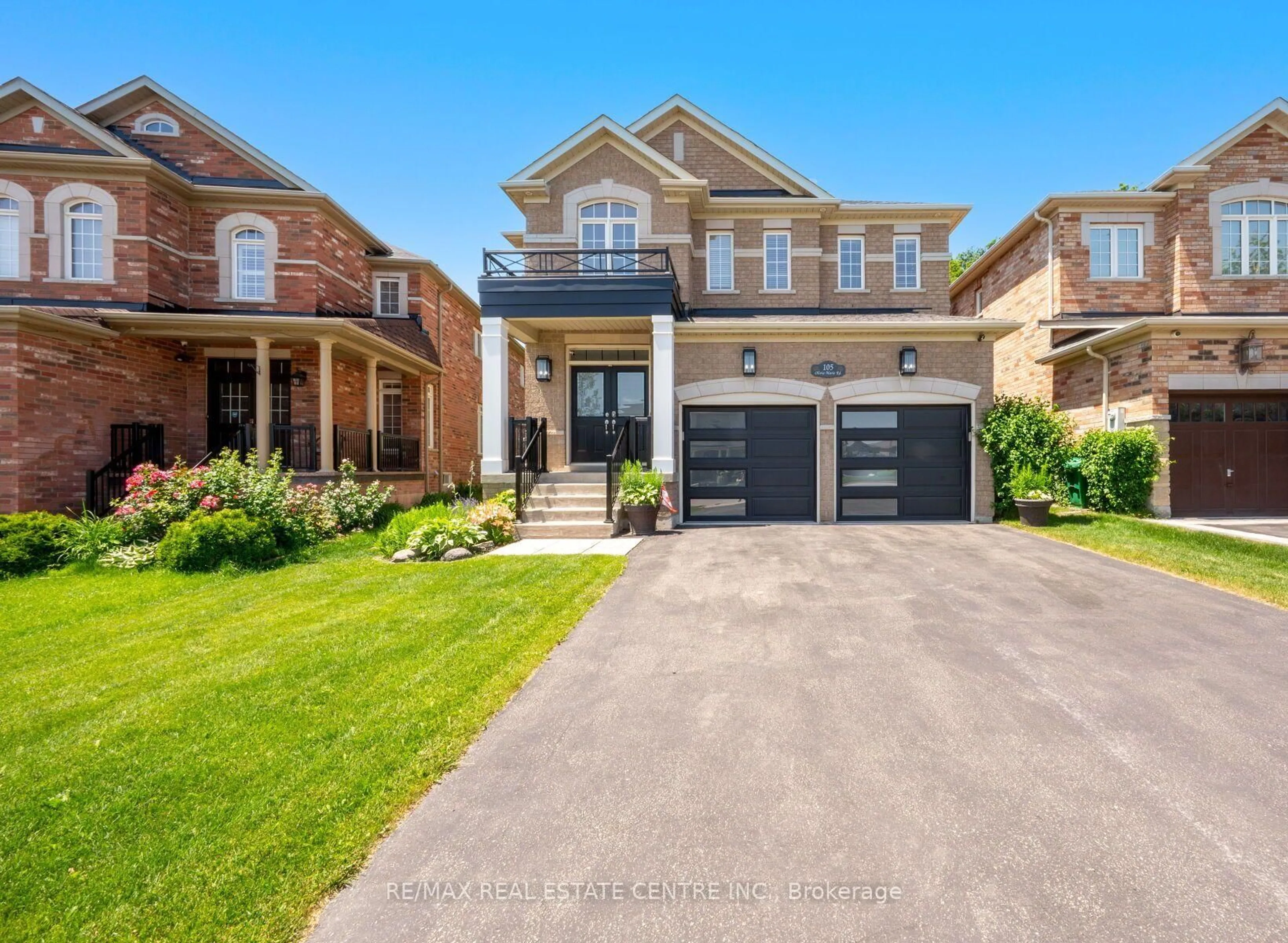 Home with brick exterior material, street for 105 Olivia Marie Rd, Brampton Ontario L6Y 0N1