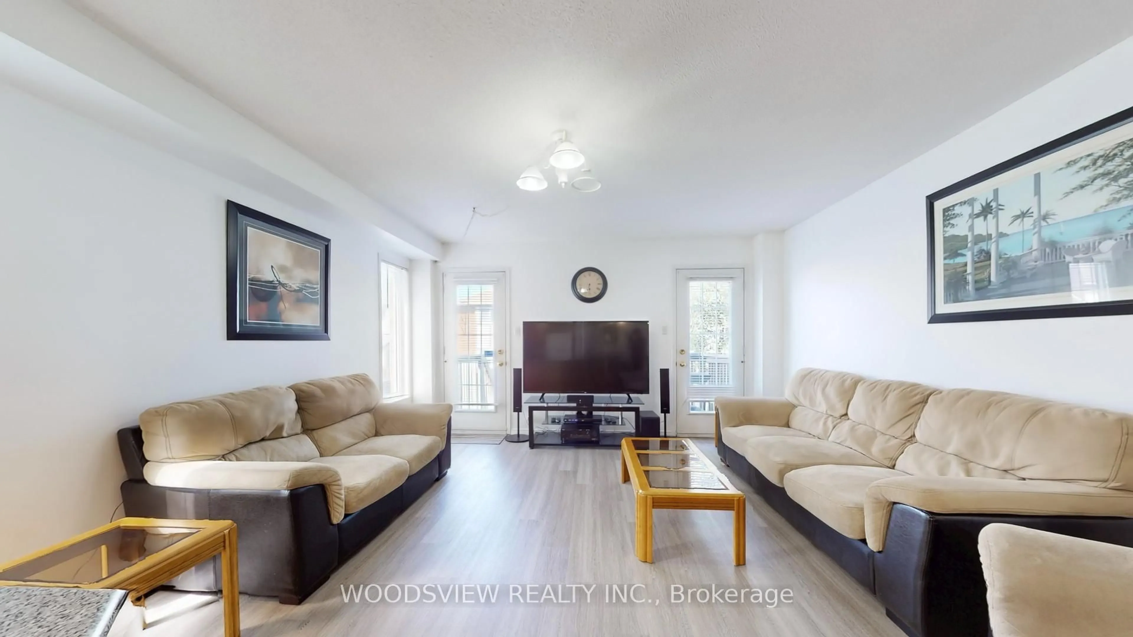 Living room with furniture, wood/laminate floor for 1171 Foxglove Pl, Mississauga Ontario L5V 2N1