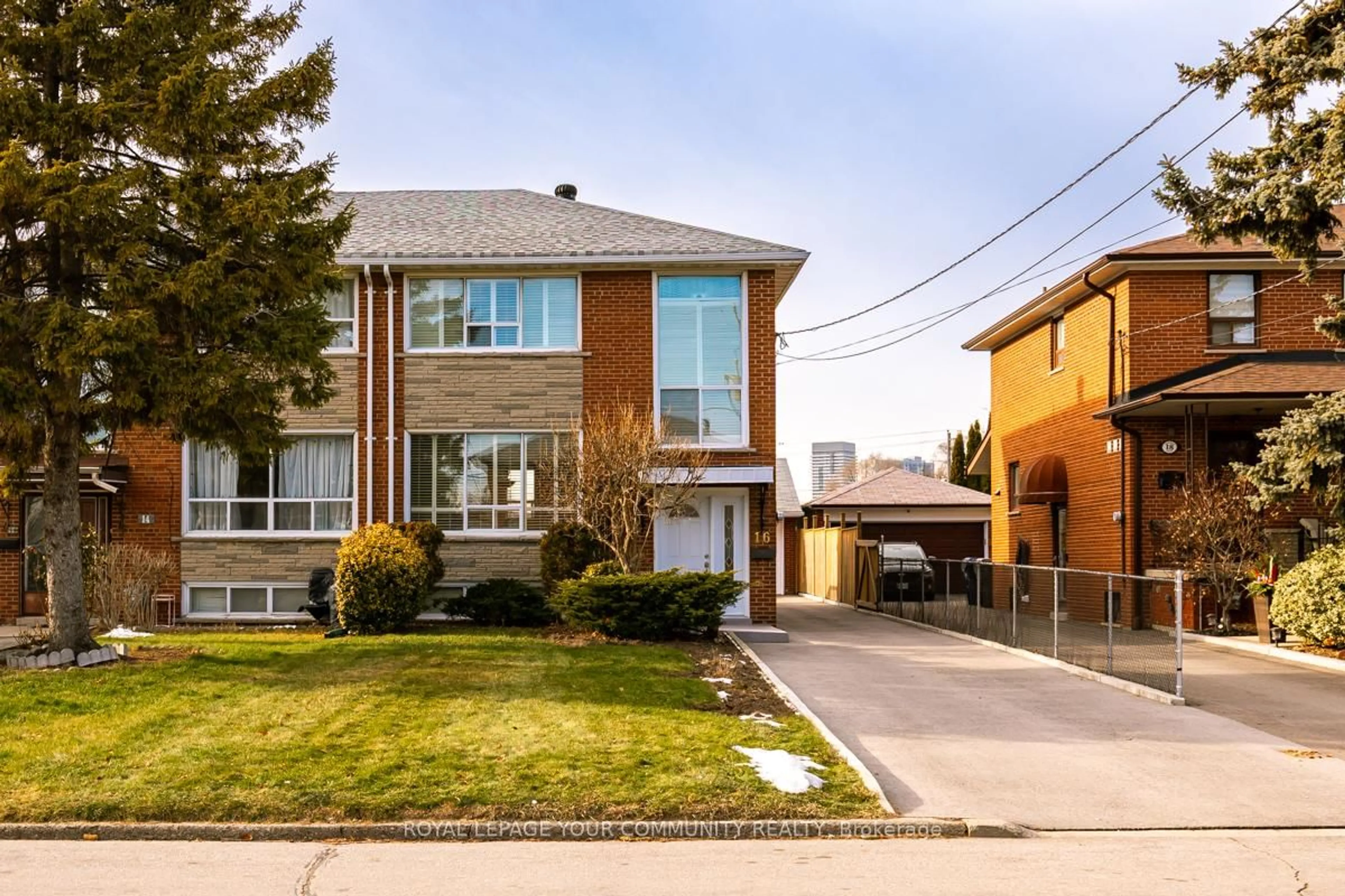 Home with brick exterior material, street for 16 Martini Dr, Toronto Ontario M6M 4X5