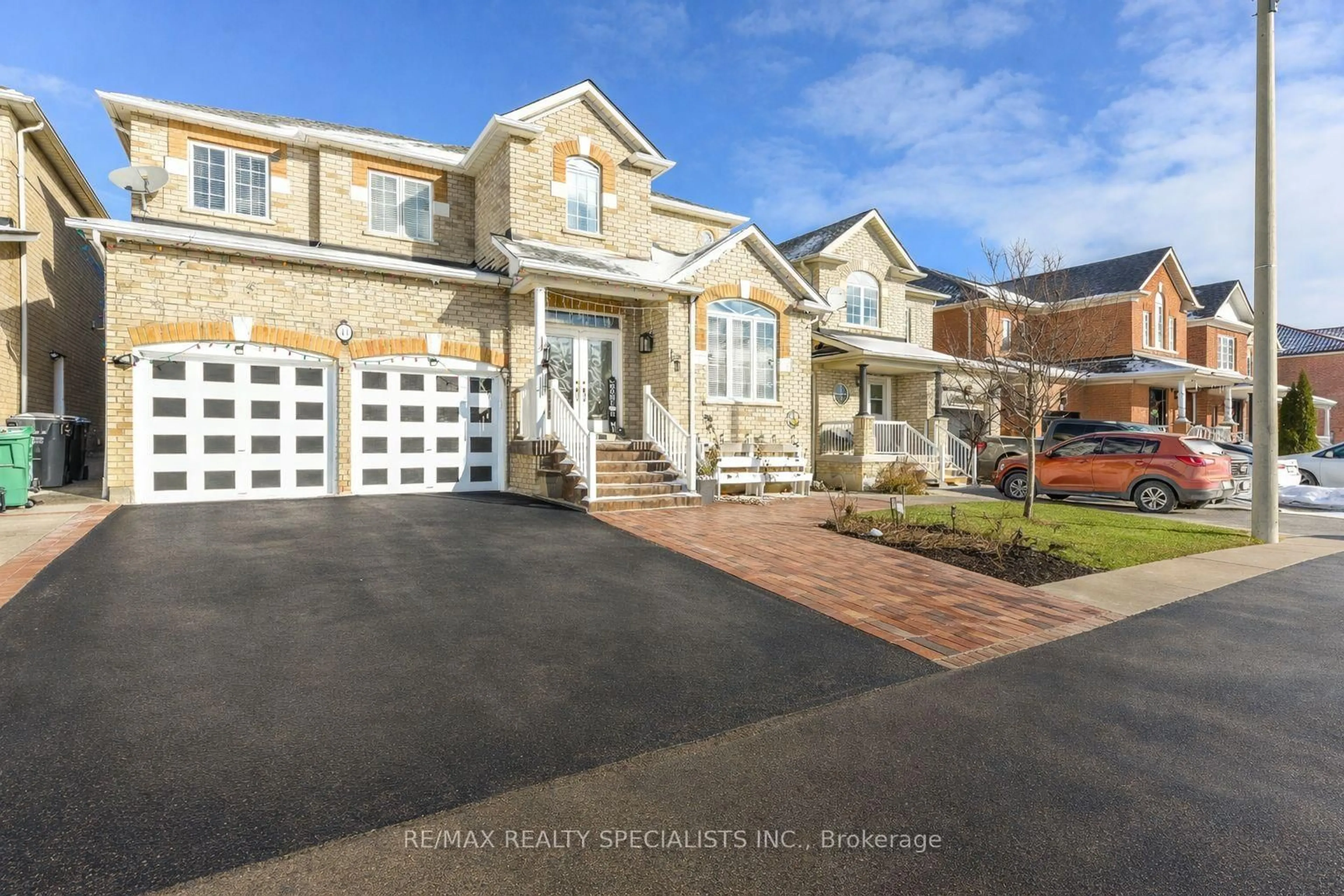 Home with brick exterior material, street for 41 Madronna Gdns, Brampton Ontario L7A 2V9