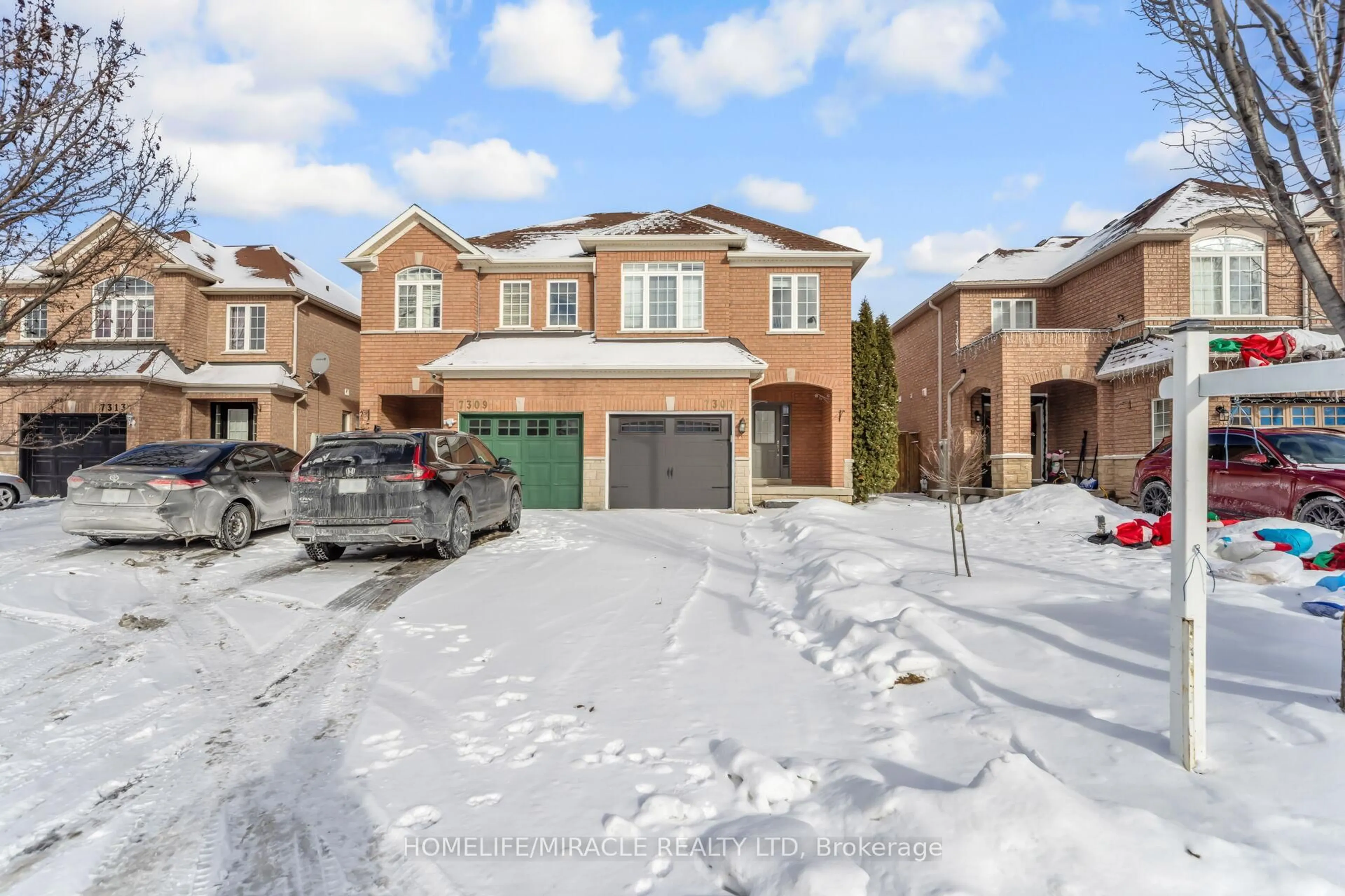 Home with brick exterior material, street for 7307 Cork Tree Row, Mississauga Ontario L5N 8N9