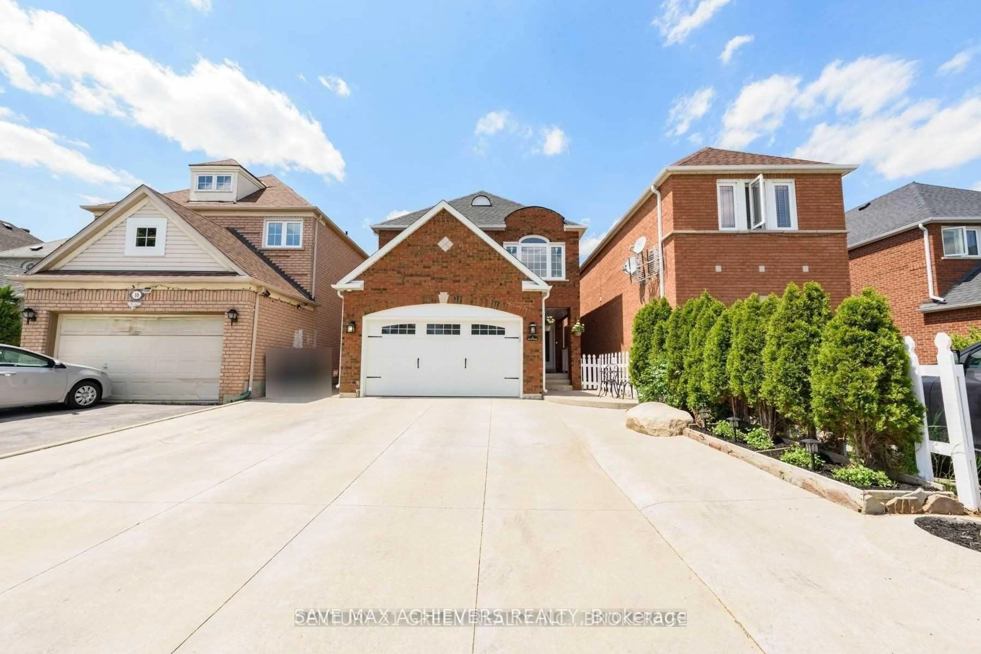 Home with brick exterior material, street for 12 Upwood Pl, Brampton Ontario L6R 1T3