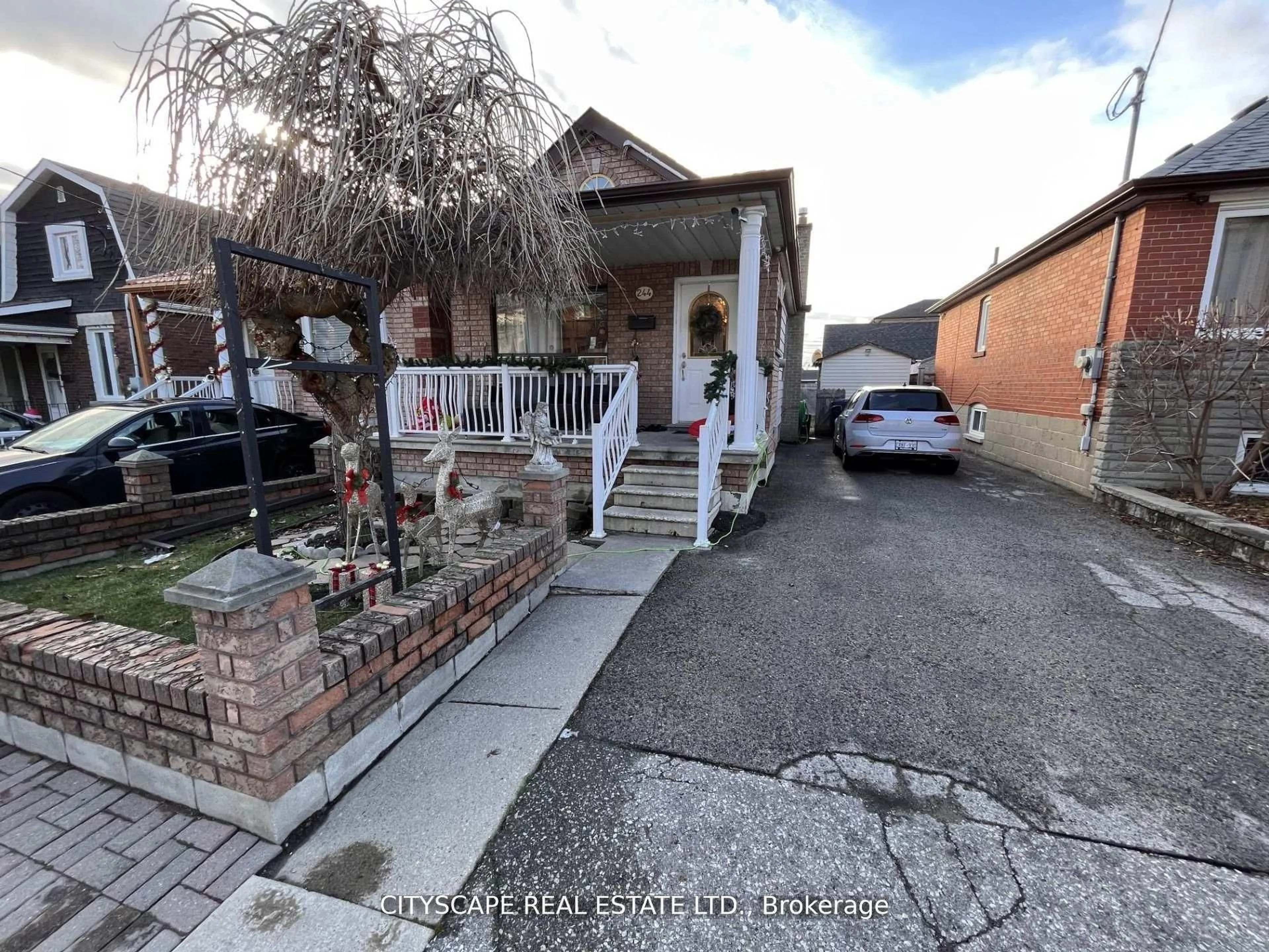 A pic from outside/outdoor area/front of a property/back of a property/a pic from drone, street for 244 Rosethorn Ave, Toronto Ontario M6M 3L1