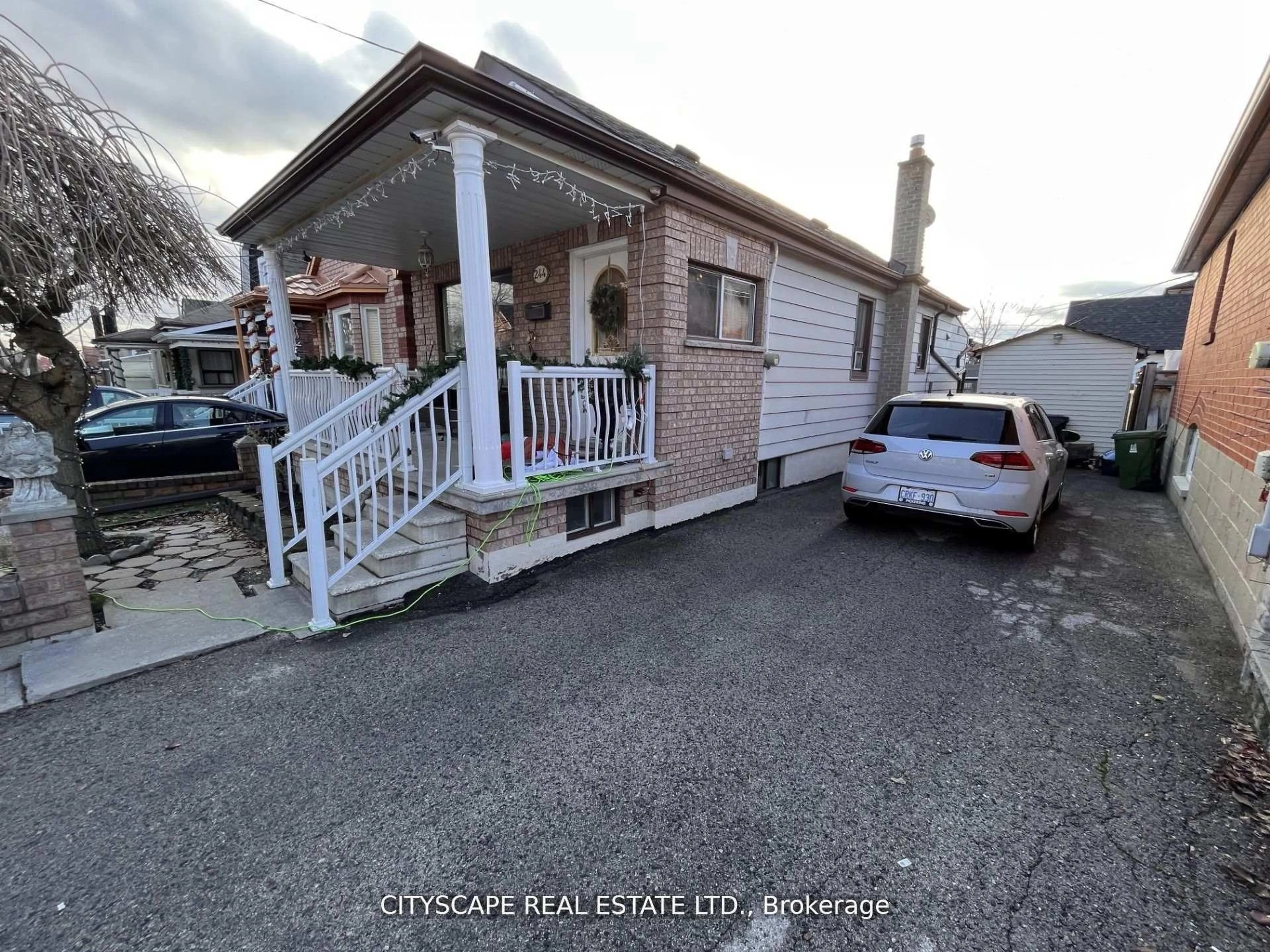 A pic from outside/outdoor area/front of a property/back of a property/a pic from drone, street for 244 Rosethorn Ave, Toronto Ontario M6M 3L1