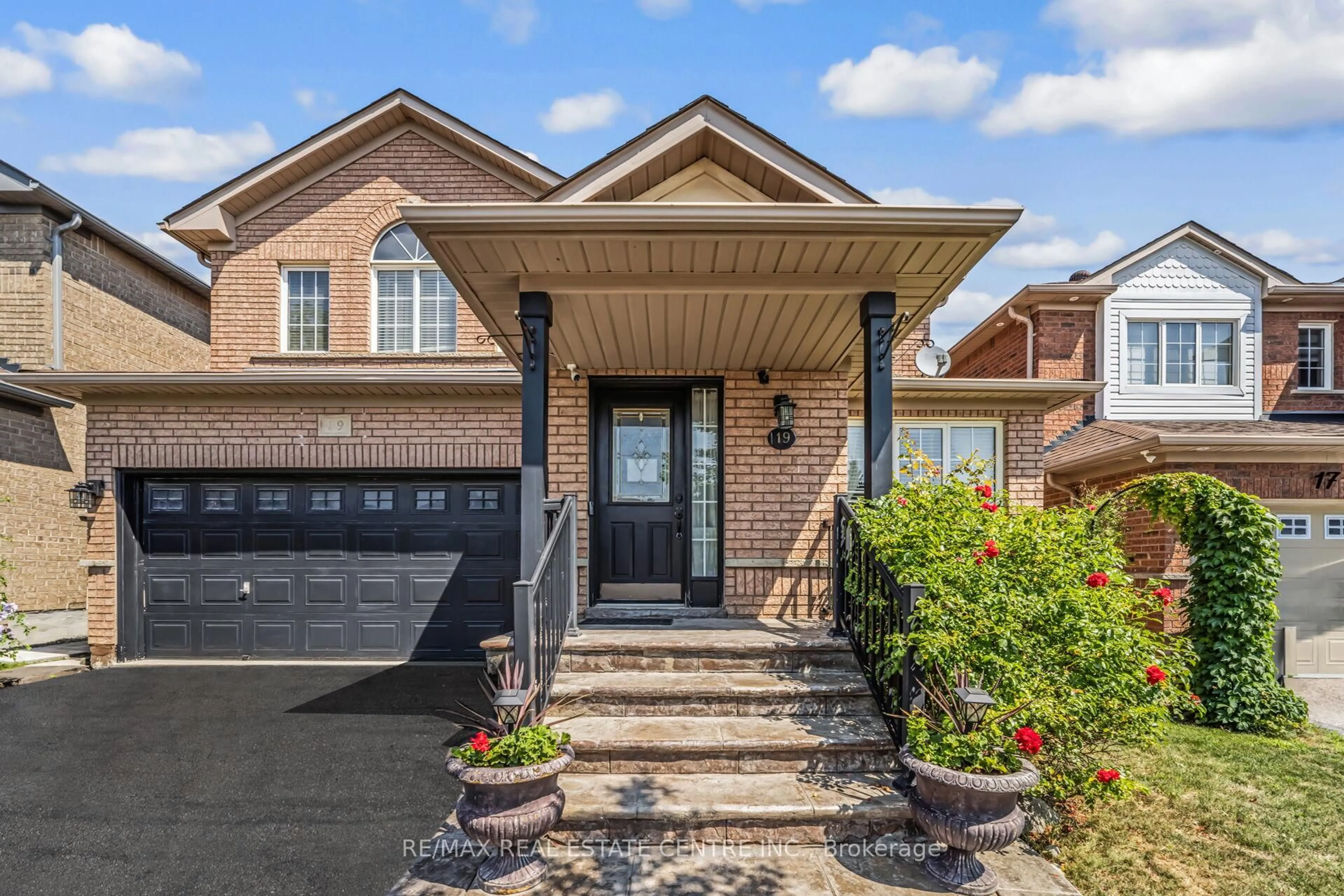 Home with brick exterior material, street for 19 Hollowgrove Blvd, Brampton Ontario L6P 1B1