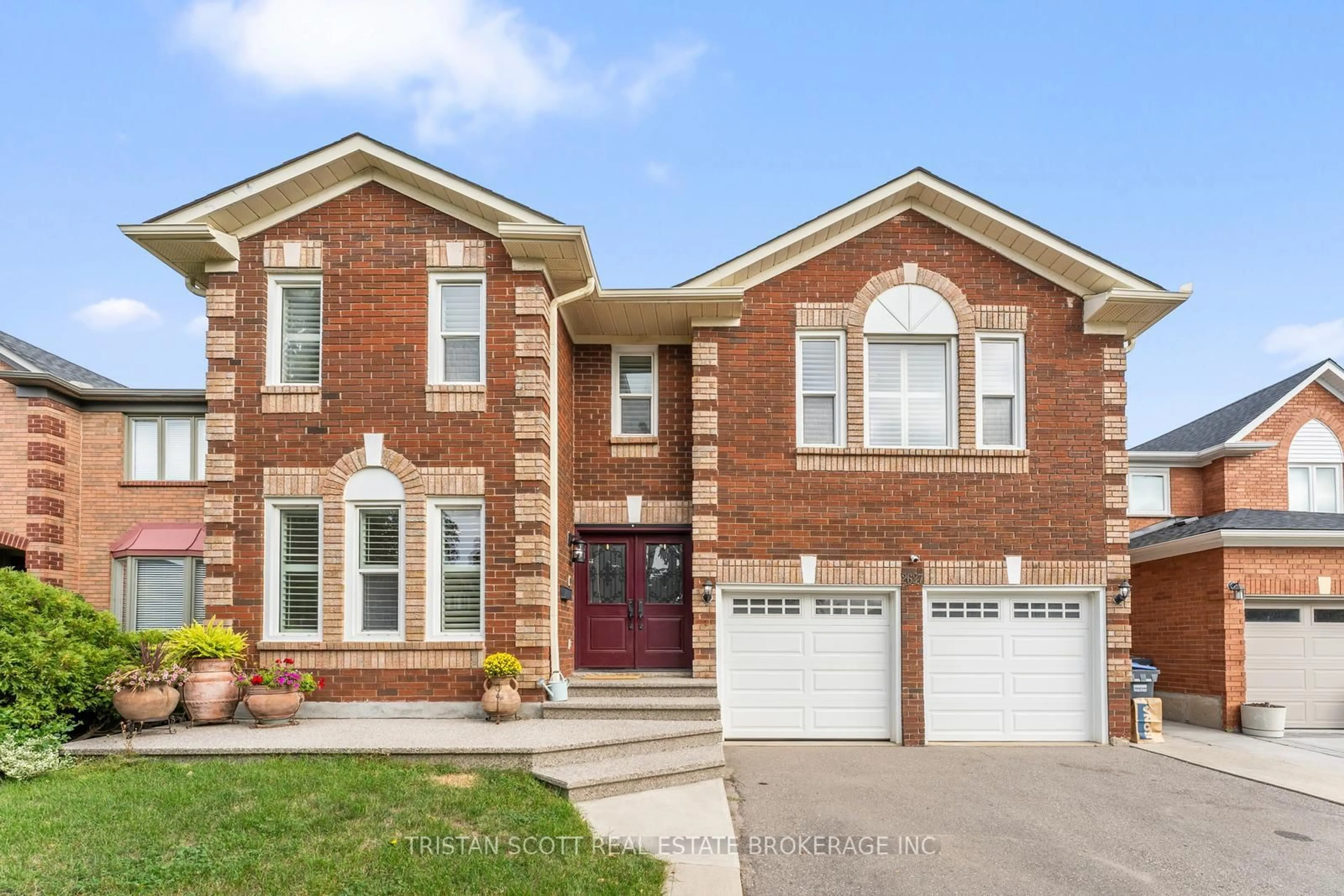 Home with brick exterior material, street for 2627 Ambercroft Tr, Mississauga Ontario L5M 4K2