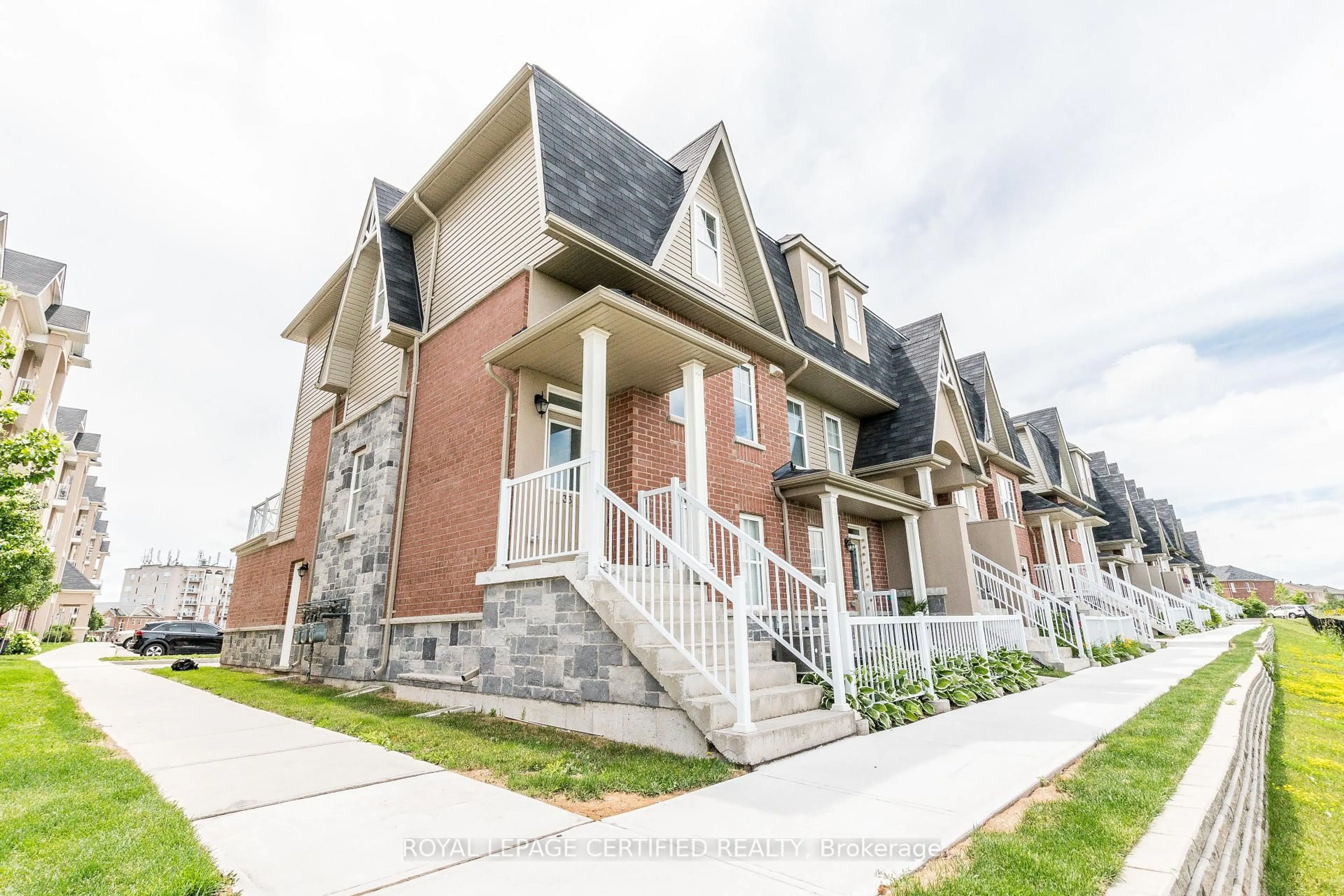 Home with brick exterior material, street for 1380 Costigan Rd #133, Milton Ontario L9T 8L2