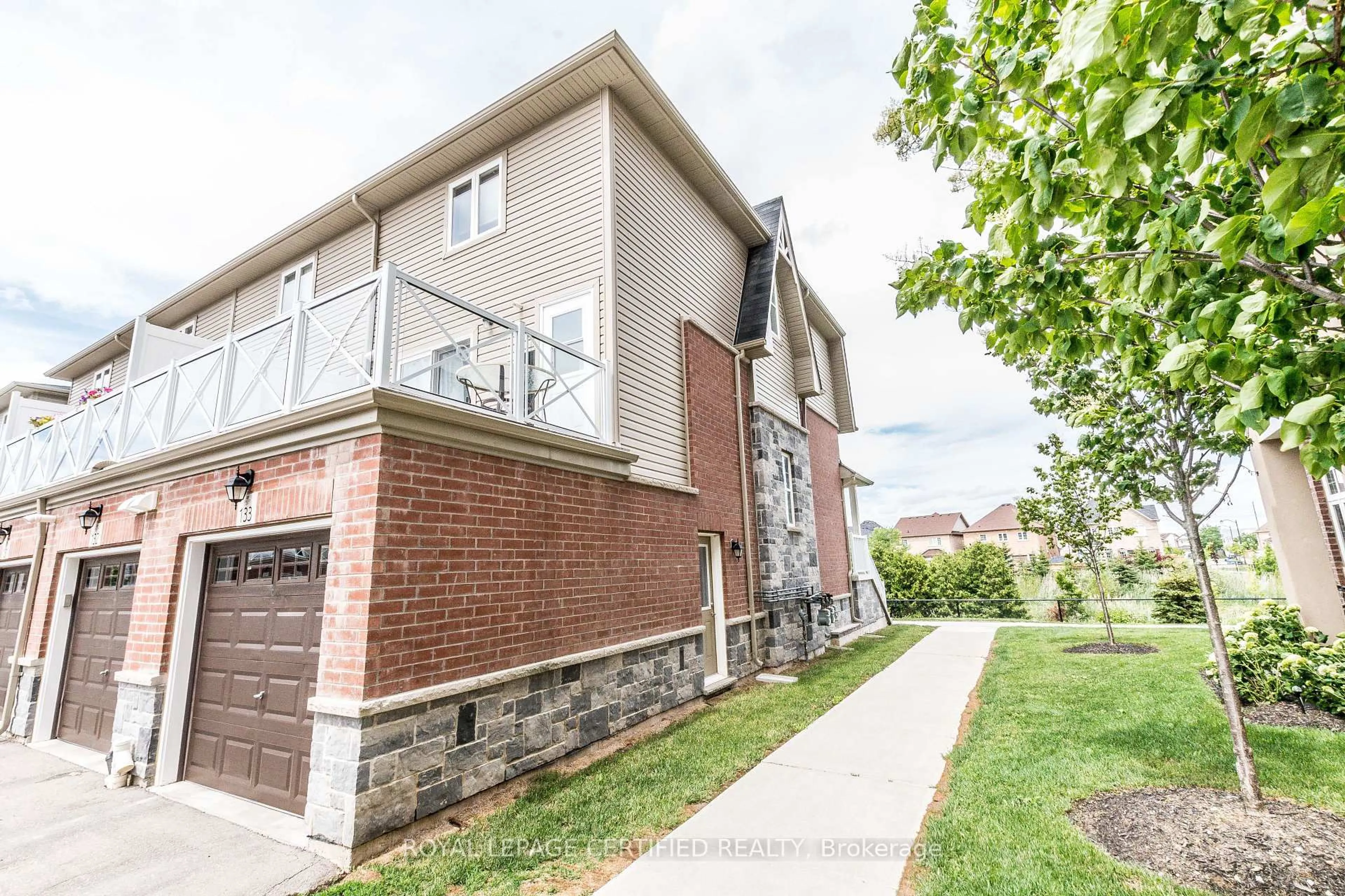 Home with brick exterior material, street for 1380 Costigan Rd #133, Milton Ontario L9T 8L2
