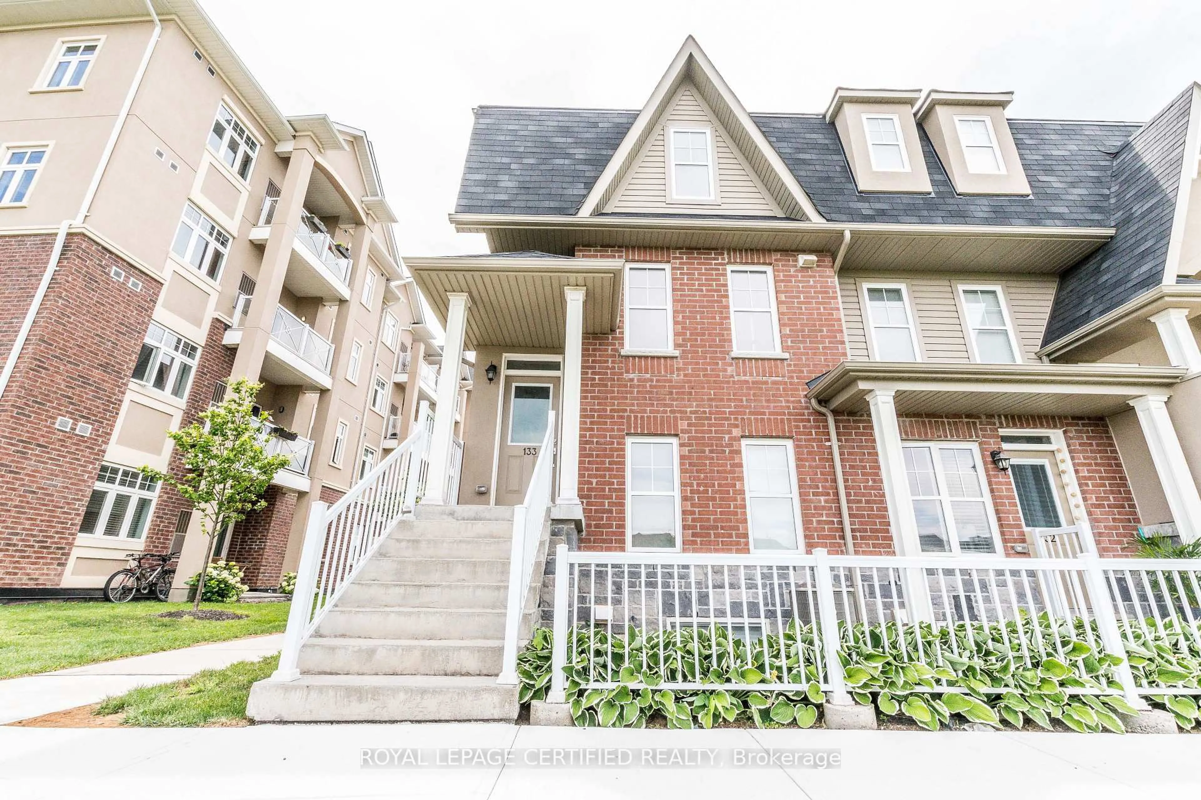 Home with brick exterior material, street for 1380 Costigan Rd #133, Milton Ontario L9T 8L2