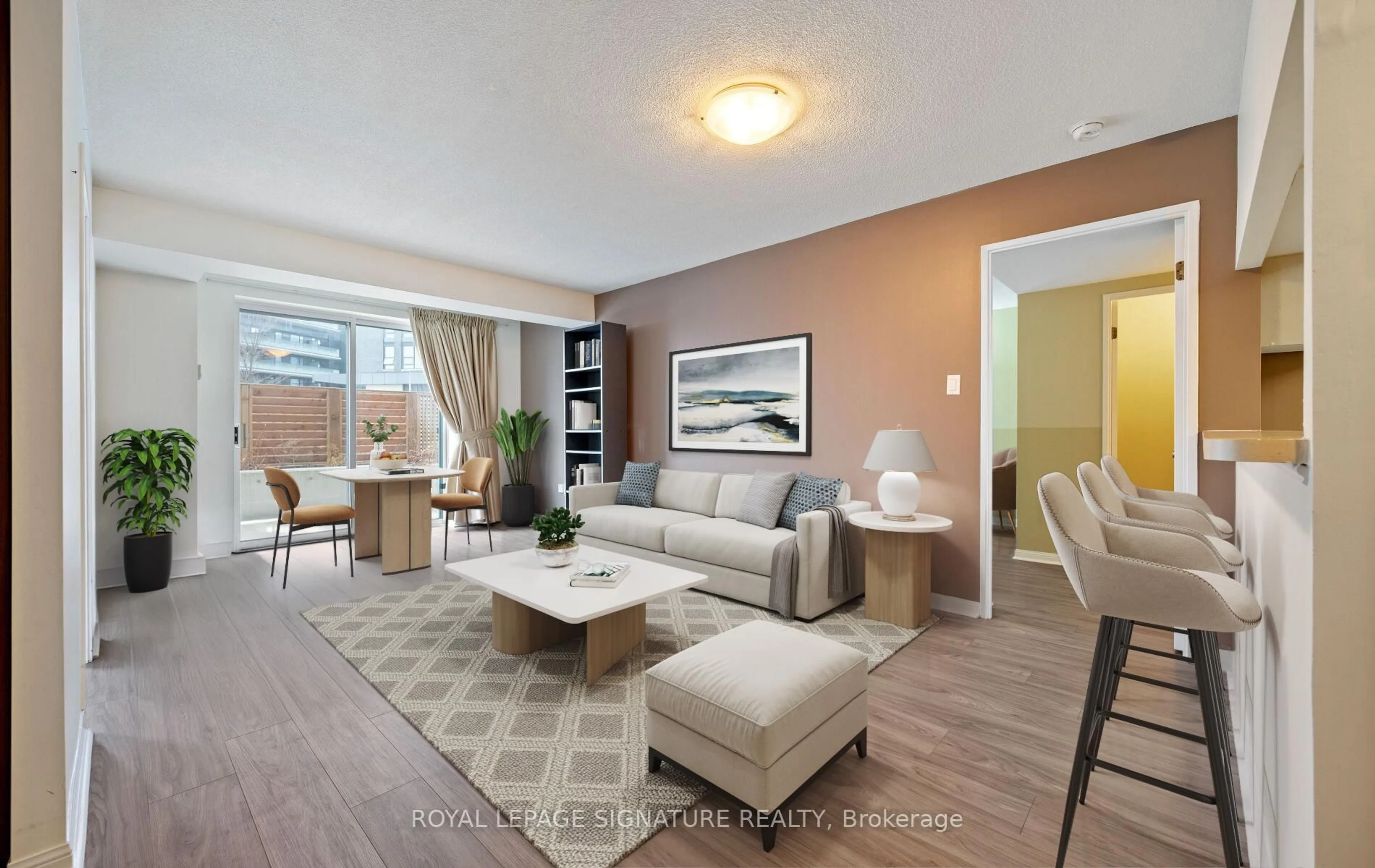 Living room with furniture, unknown for 101 Subway Cres #102, Toronto Ontario M9B 6K4