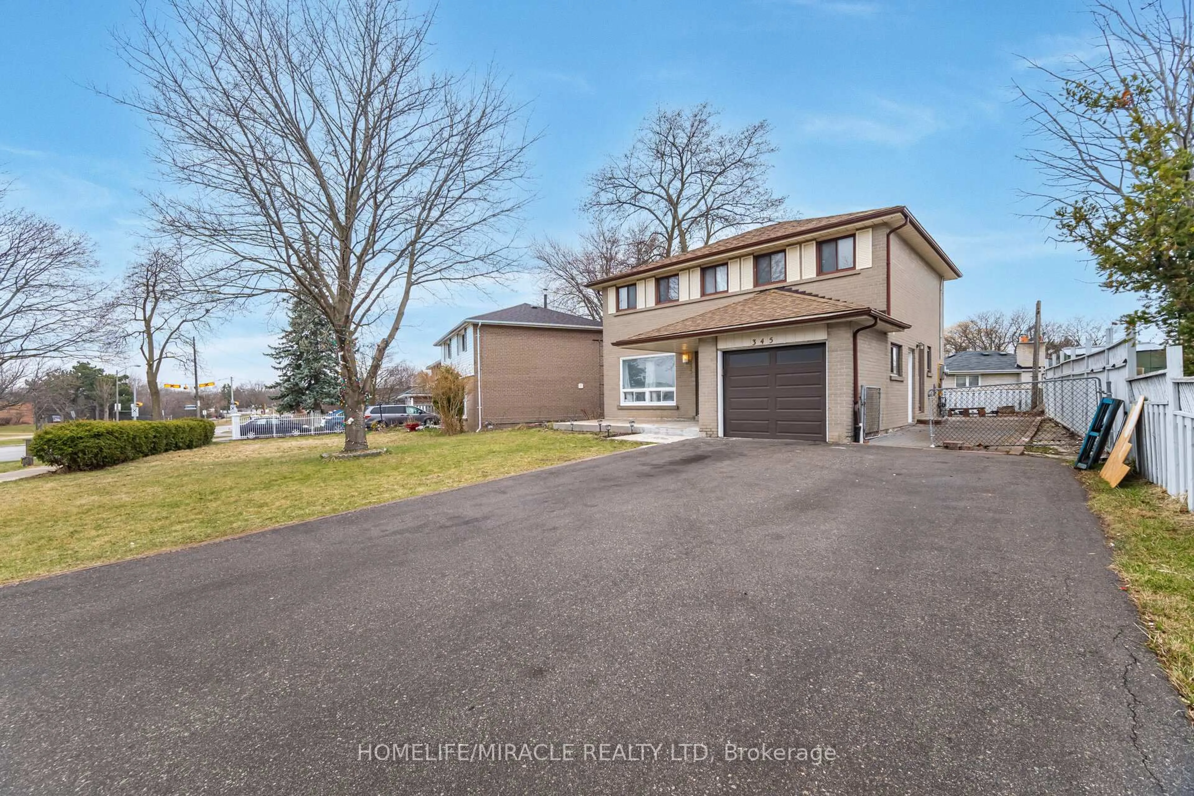 A pic from outside/outdoor area/front of a property/back of a property/a pic from drone, water/lake/river/ocean view for 345 Silverstone Dr, Toronto Ontario M9V 3J8