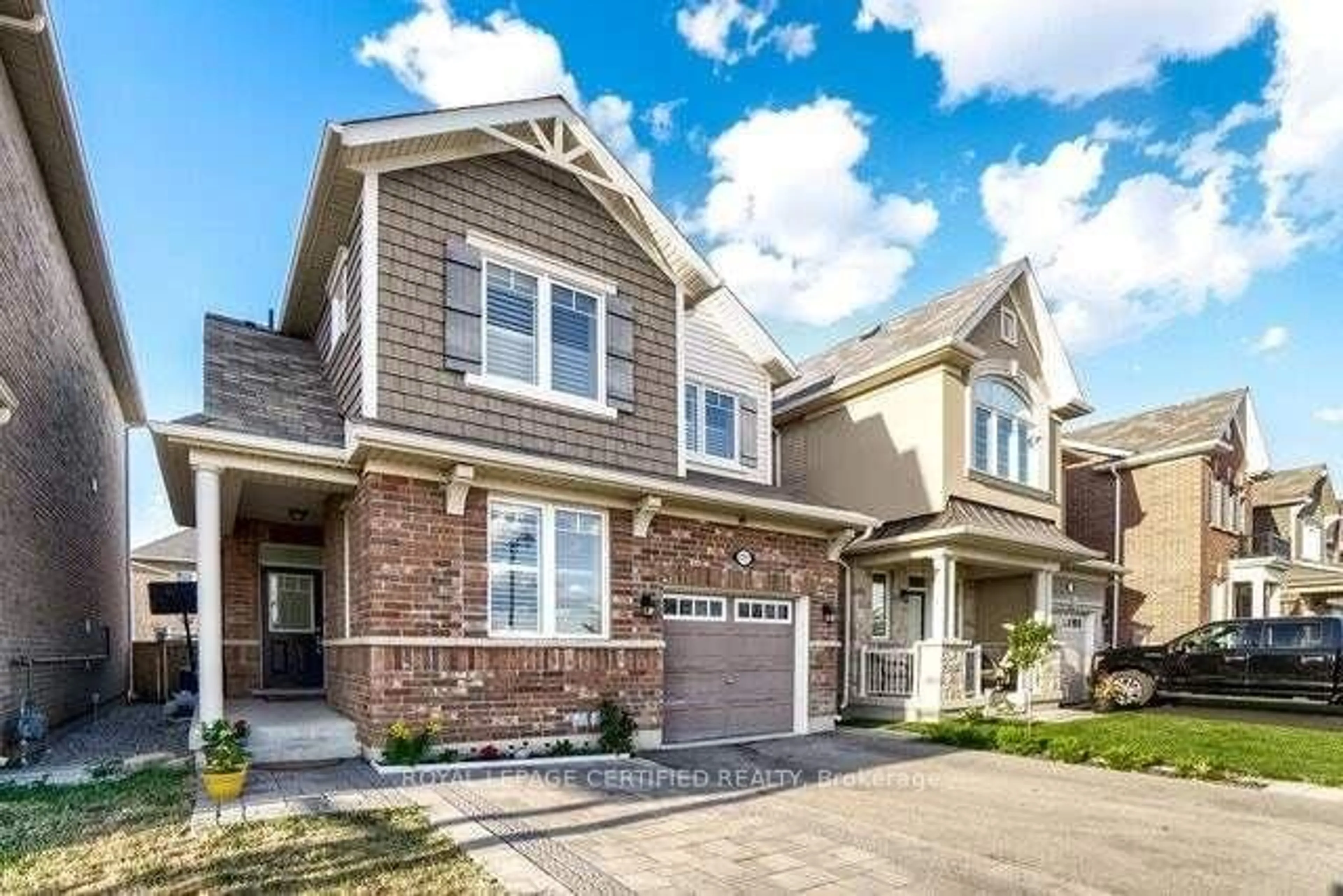 Home with brick exterior material, street for 1377 Leger Way, Milton Ontario L9T 7K6