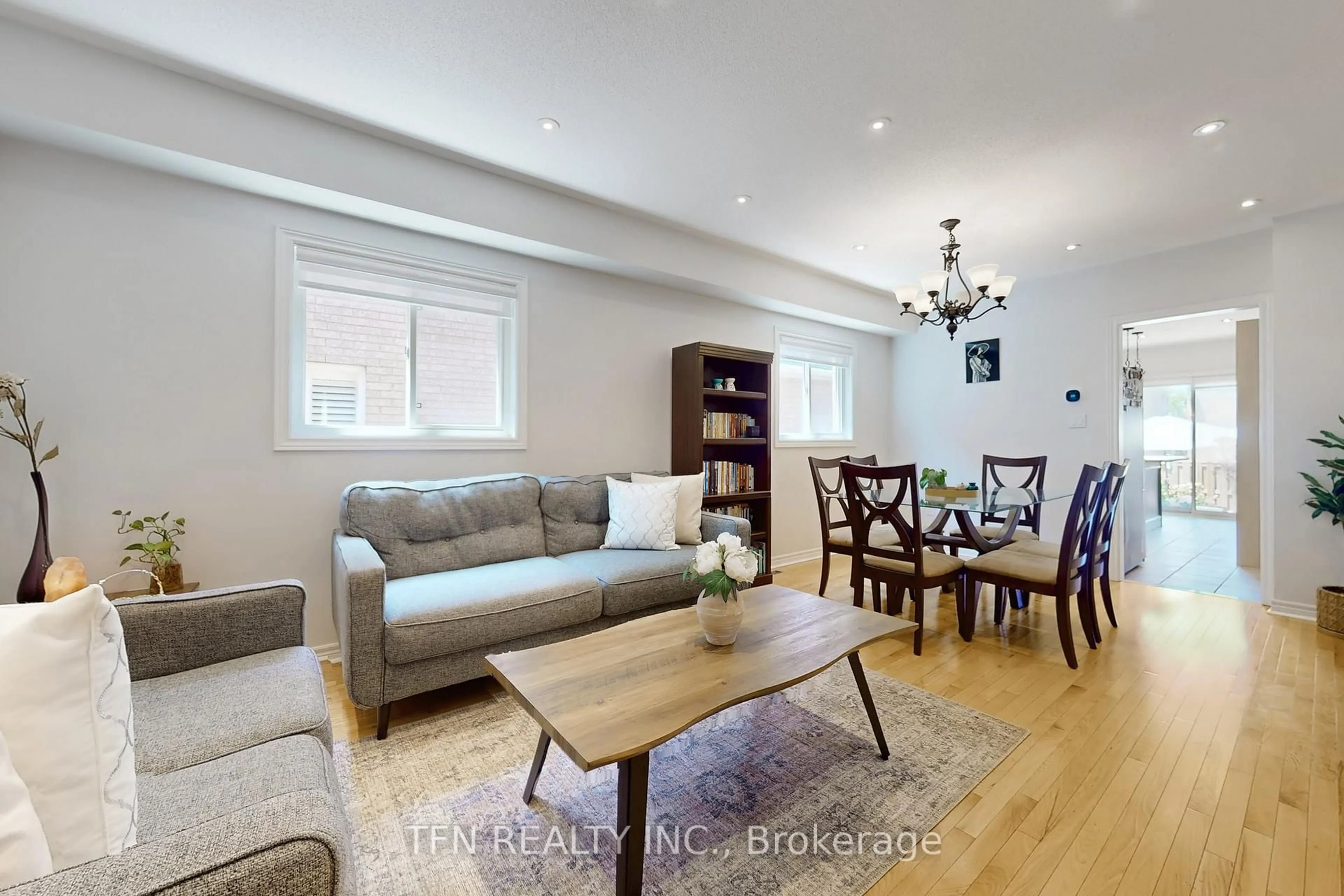 Living room with furniture, wood/laminate floor for 851 Clemens Cres, Mississauga Ontario L5V 2S8