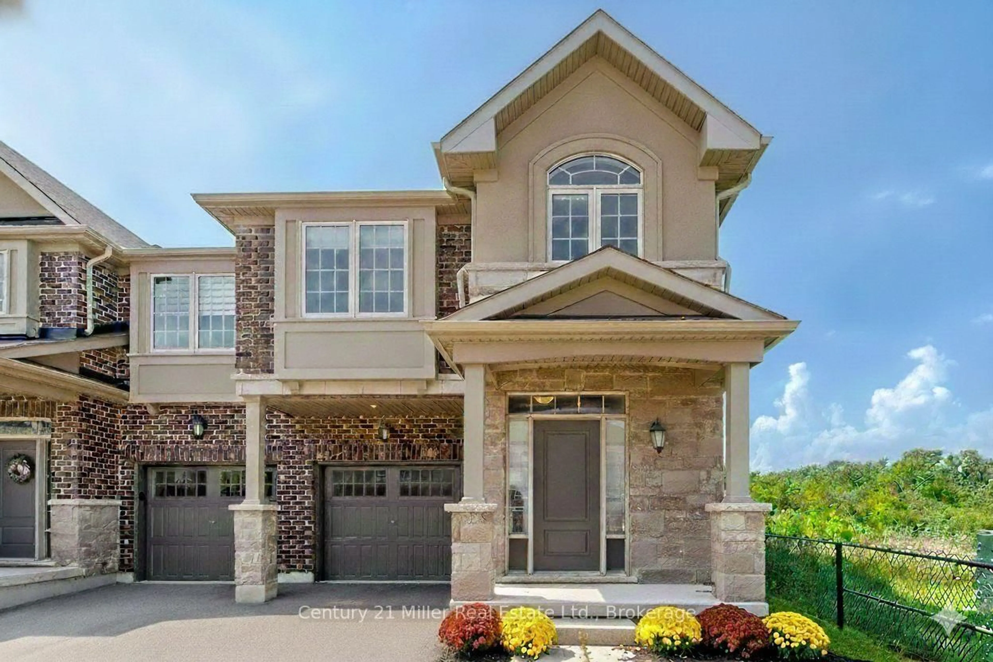 Home with brick exterior material, street for 399 Threshing Mill Blvd, Oakville Ontario L6H 0P5