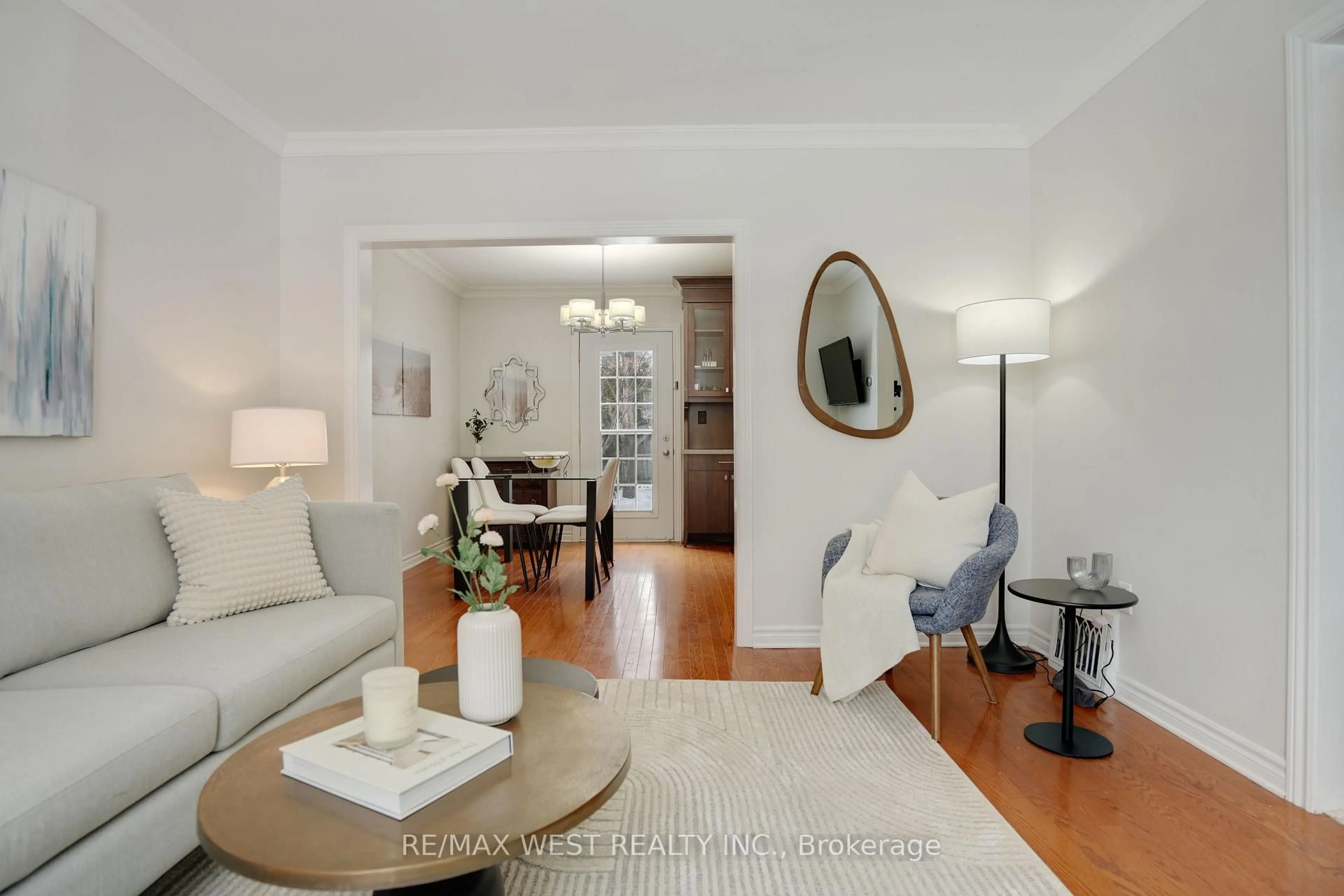 Living room with furniture, wood/laminate floor for 10 Allanbrooke Dr, Toronto Ontario M9A 3N8