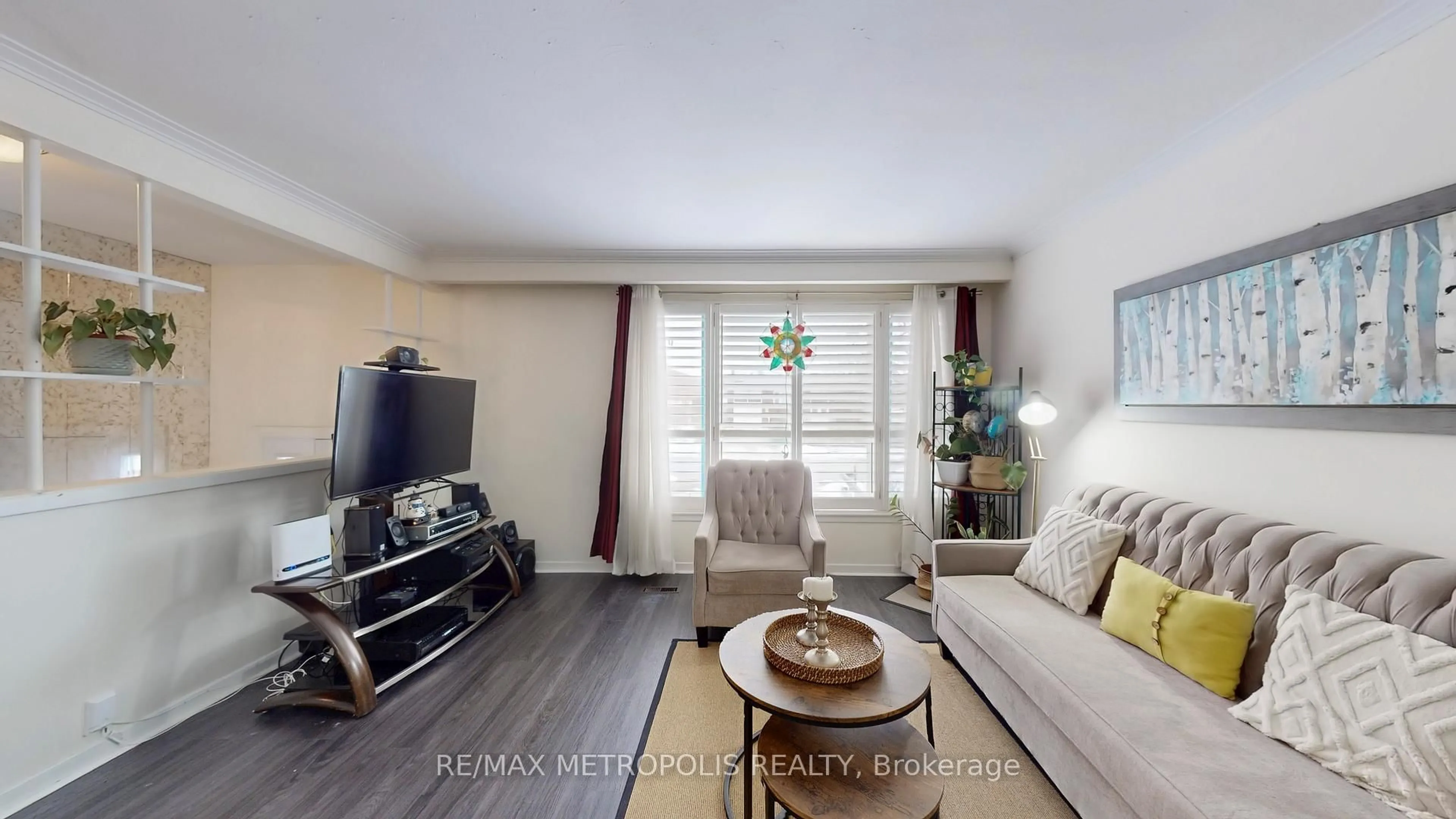 Living room with furniture, wood/laminate floor for 68 Paulvale Cres, Toronto Ontario M3J 1K5