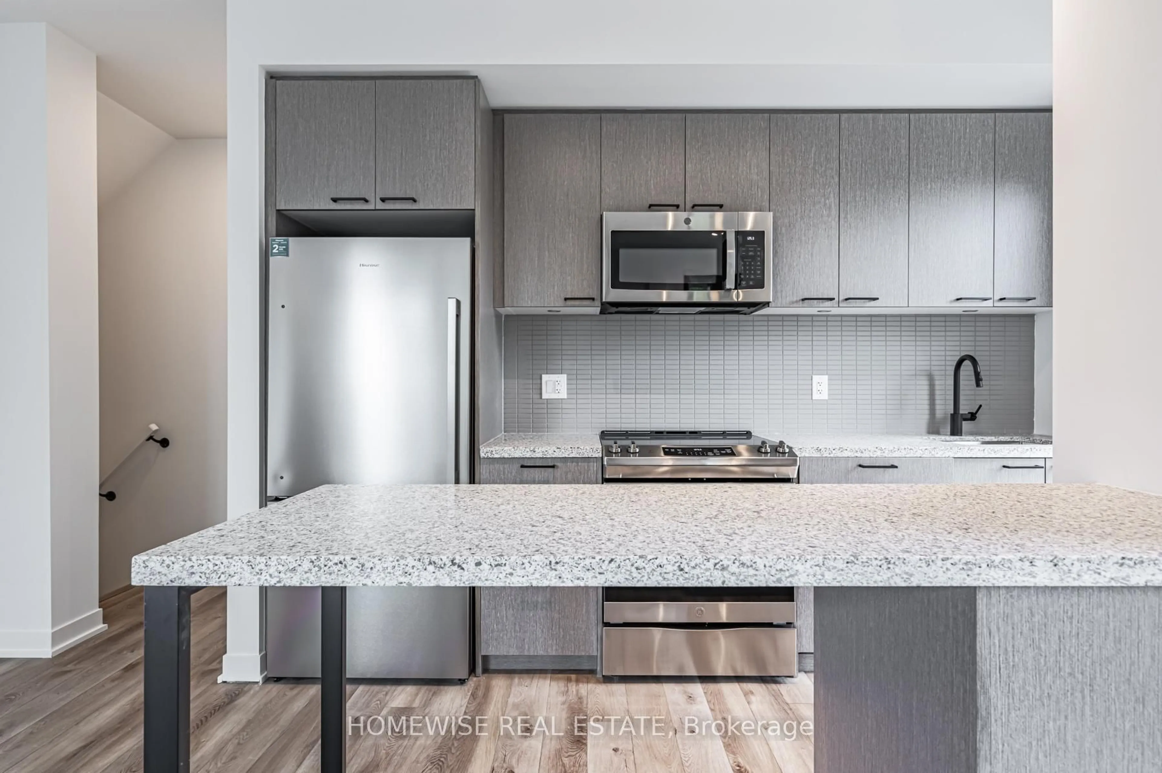 Open concept kitchen, unknown for 20 Ed Clark Gdns #TH8, Toronto Ontario M6N 0B5