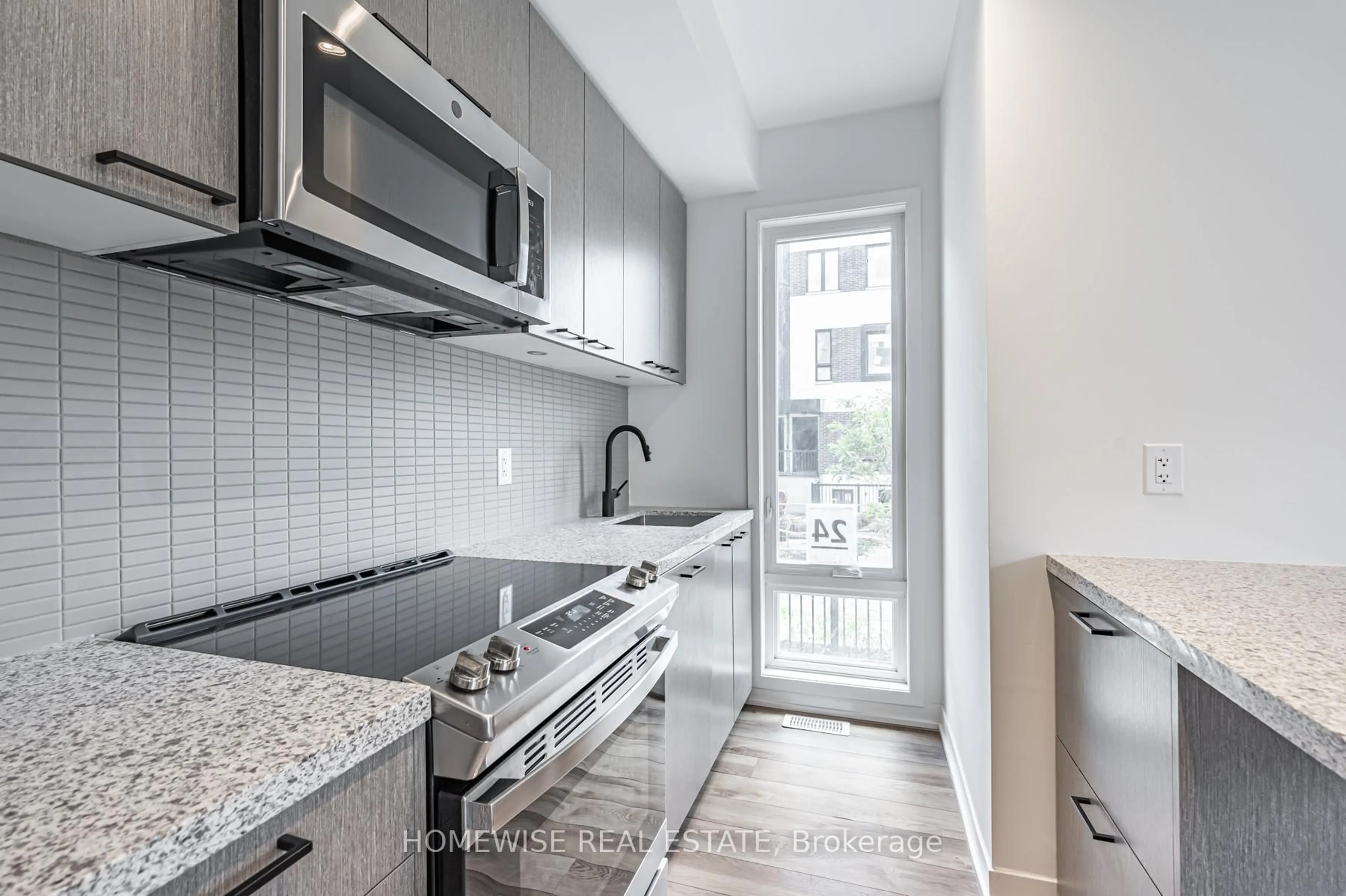Standard kitchen, unknown for 20 Ed Clark Gdns #TH8, Toronto Ontario M6N 0B5