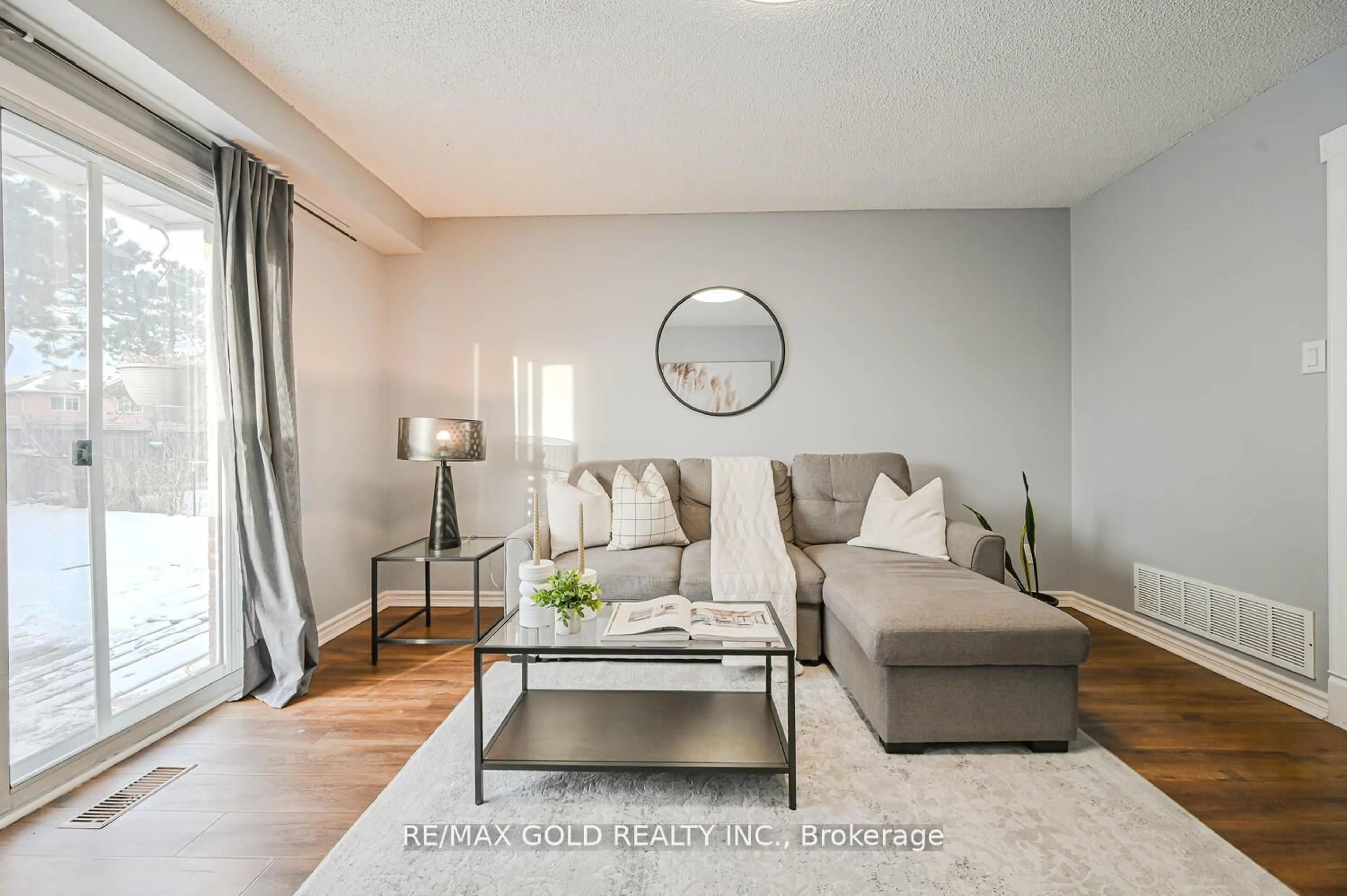 Living room with furniture, unknown for 73 Chipmunk Cres, Brampton Ontario L6R 1B4