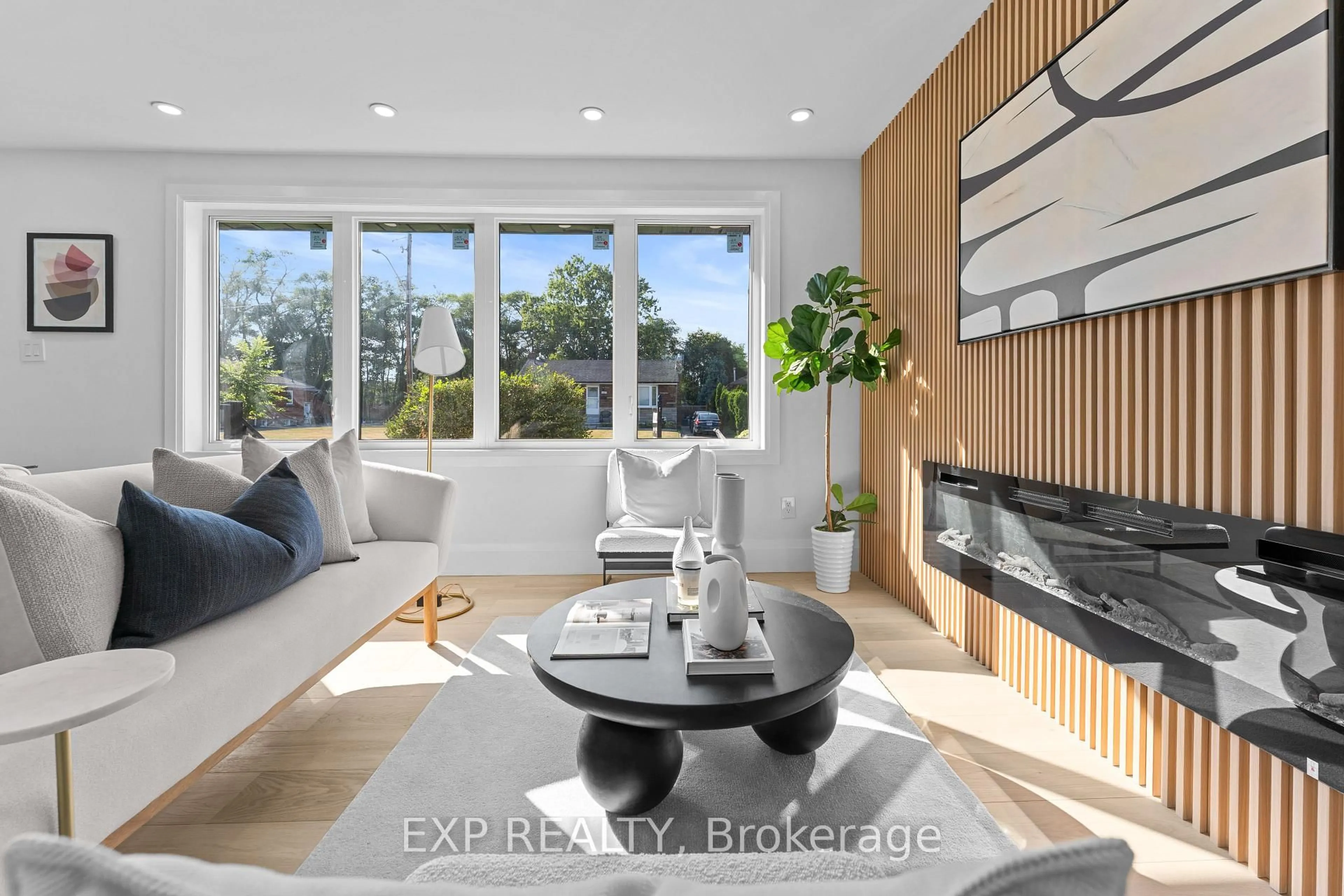 Living room with furniture, wood/laminate floor for 686 Wickens Ave, Burlington Ontario L7T 3T2