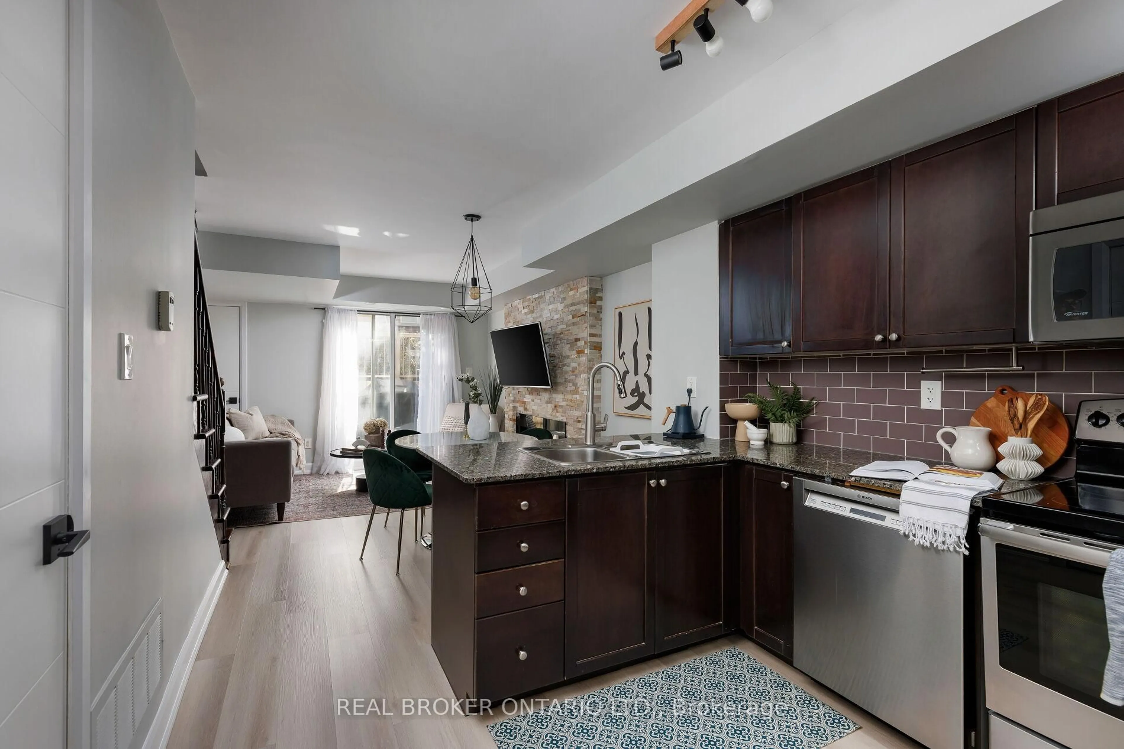 Open concept kitchen, ceramic/tile floor for 35 Elsie Lane #146, Toronto Ontario M6P 3N3