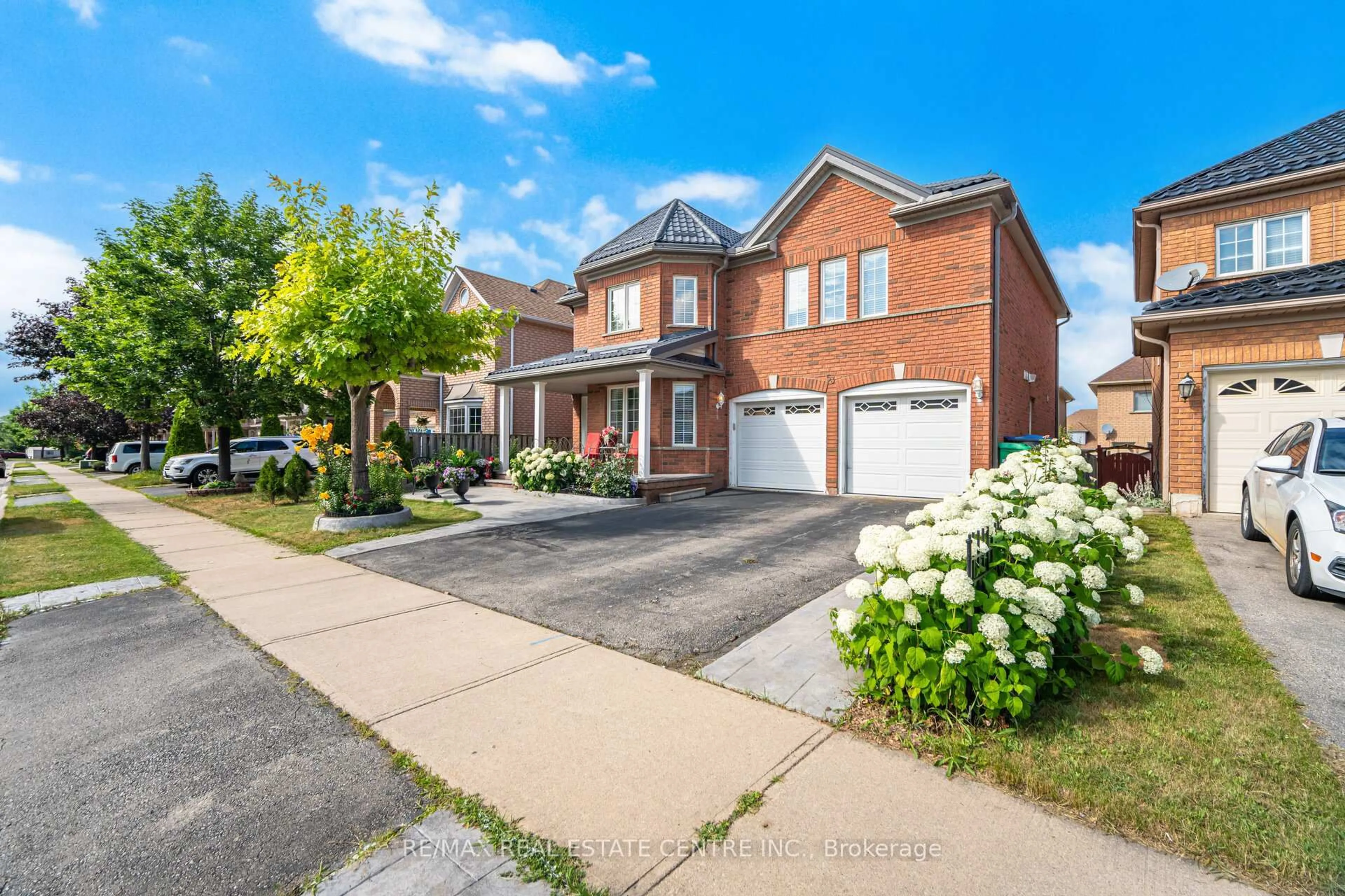 Home with brick exterior material, street for 53 Wild Indigo Cres, Brampton Ontario L6R 2K3