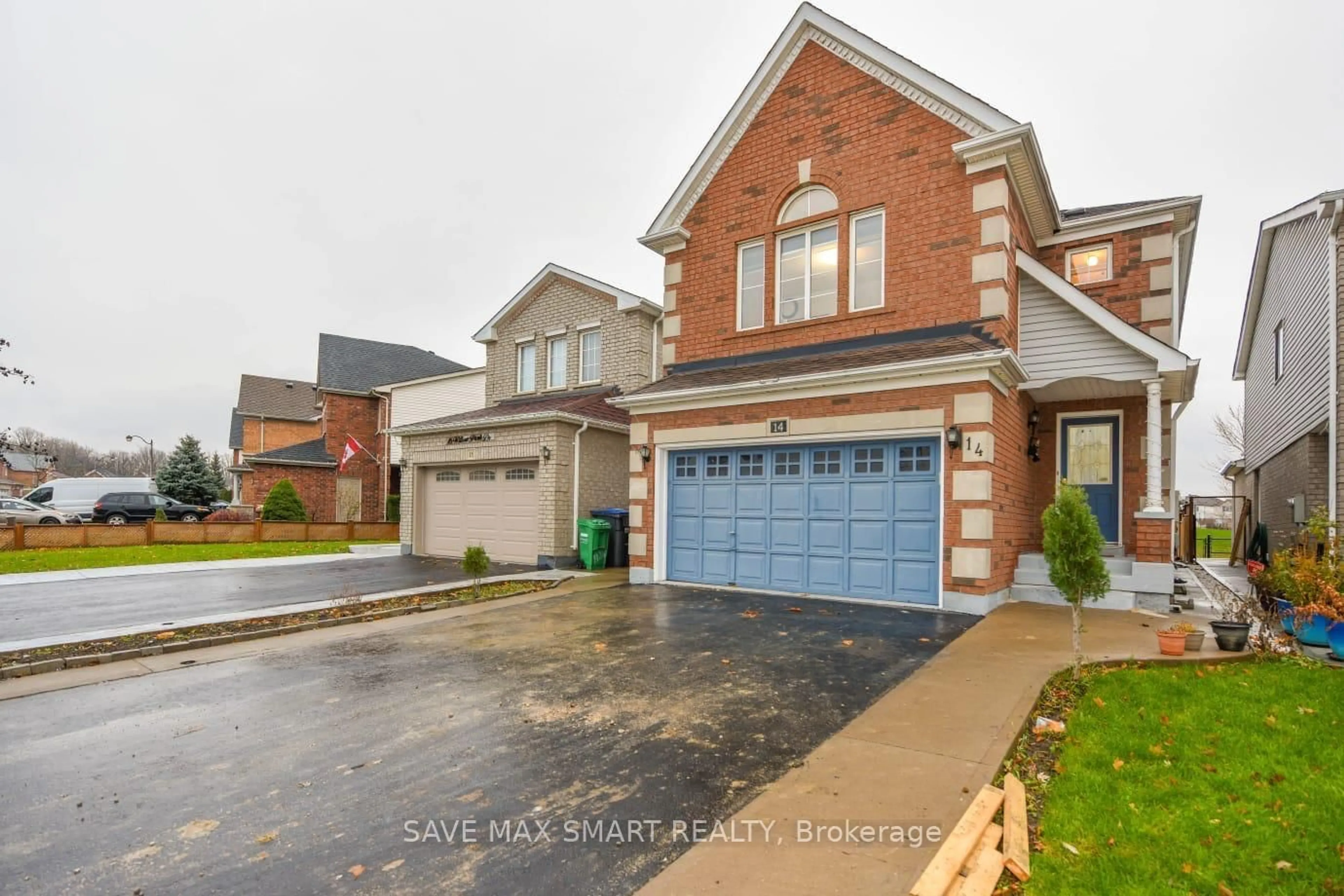 Home with brick exterior material, street for 14 Willow Park Dr, Brampton Ontario L6R 2M9