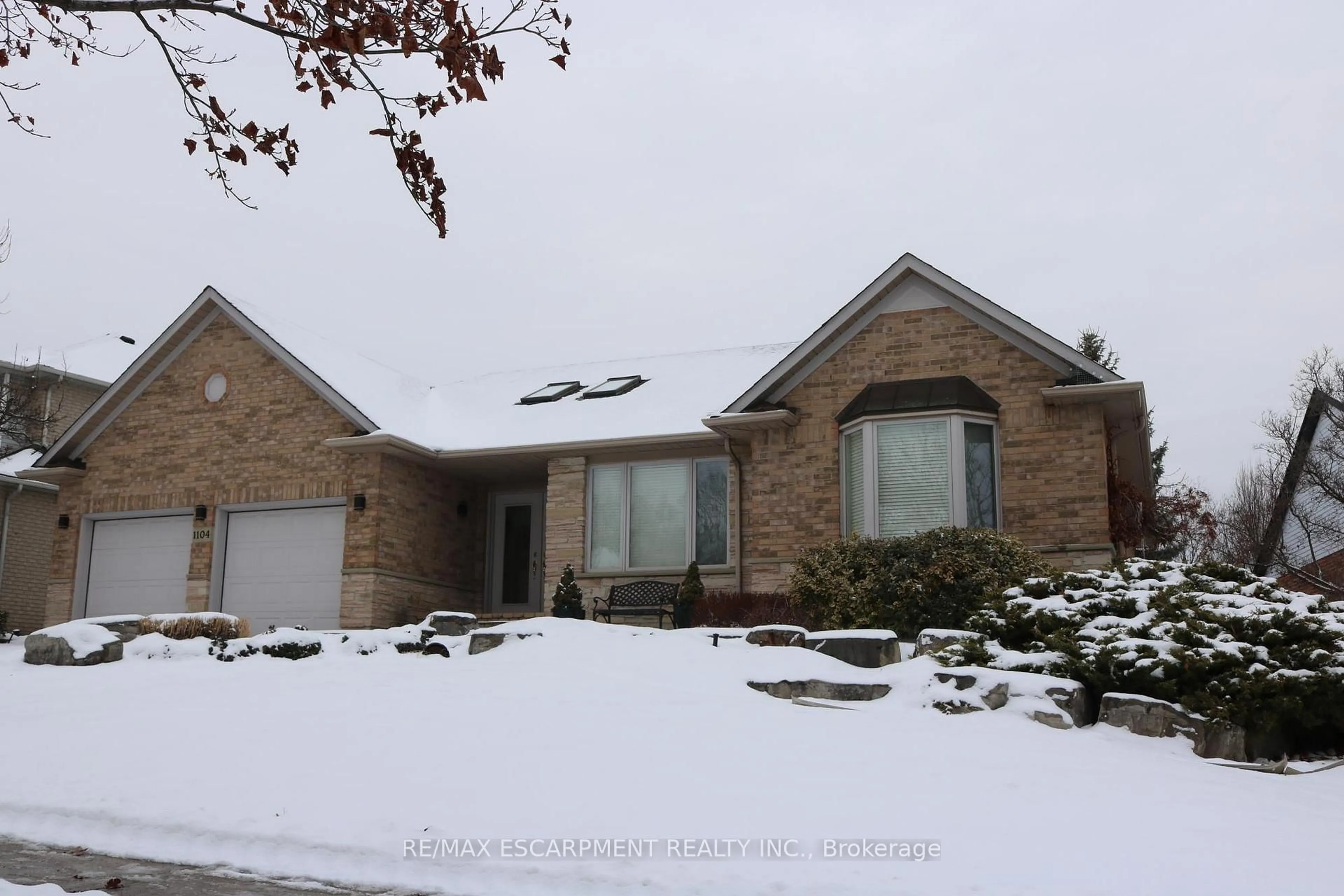 Home with brick exterior material, street for 1104 Crofton Way, Burlington Ontario L7P 4W8