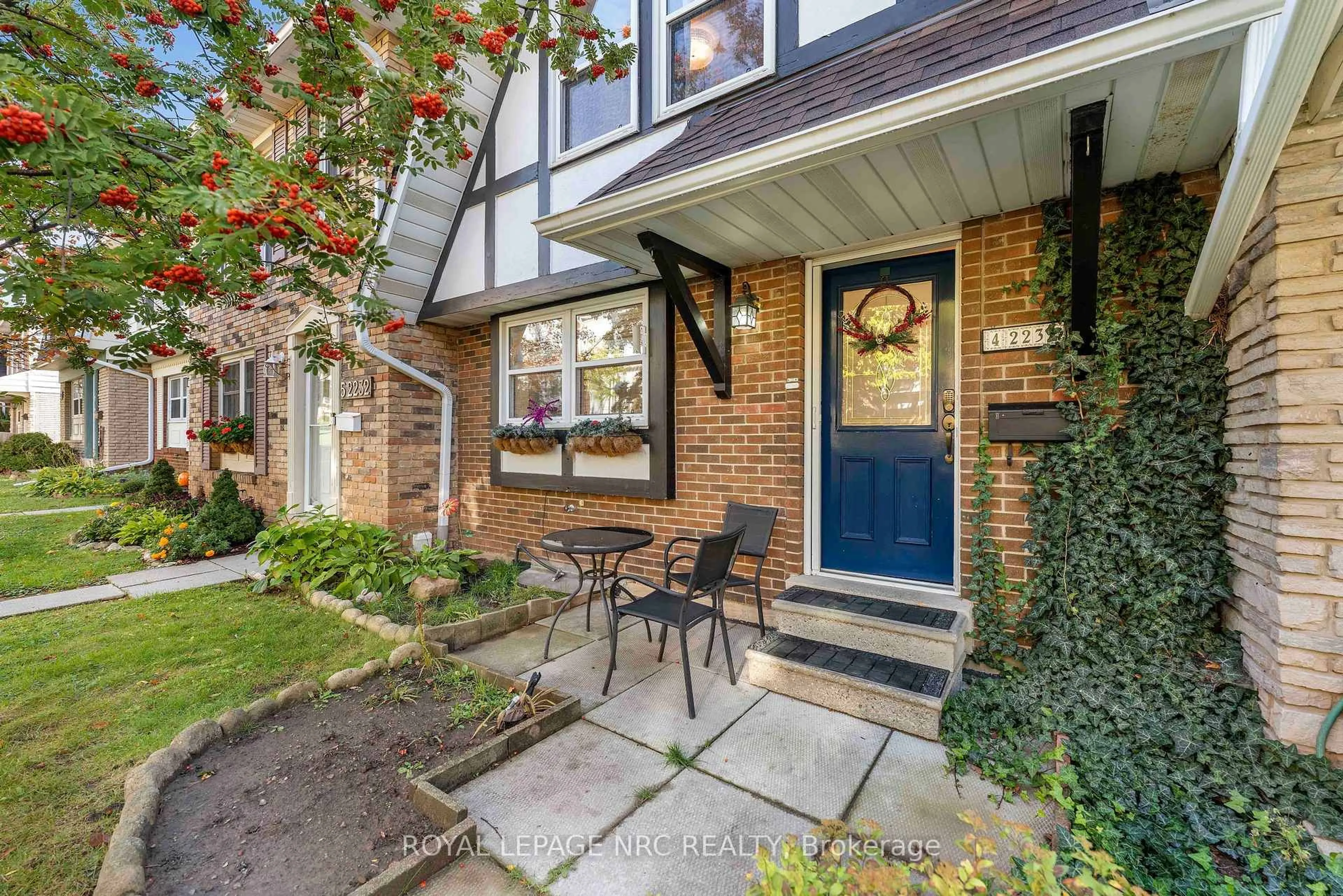 Home with brick exterior material, street for 2232 Upper Middle Rd #4, Burlington Ontario L7P 2Z9