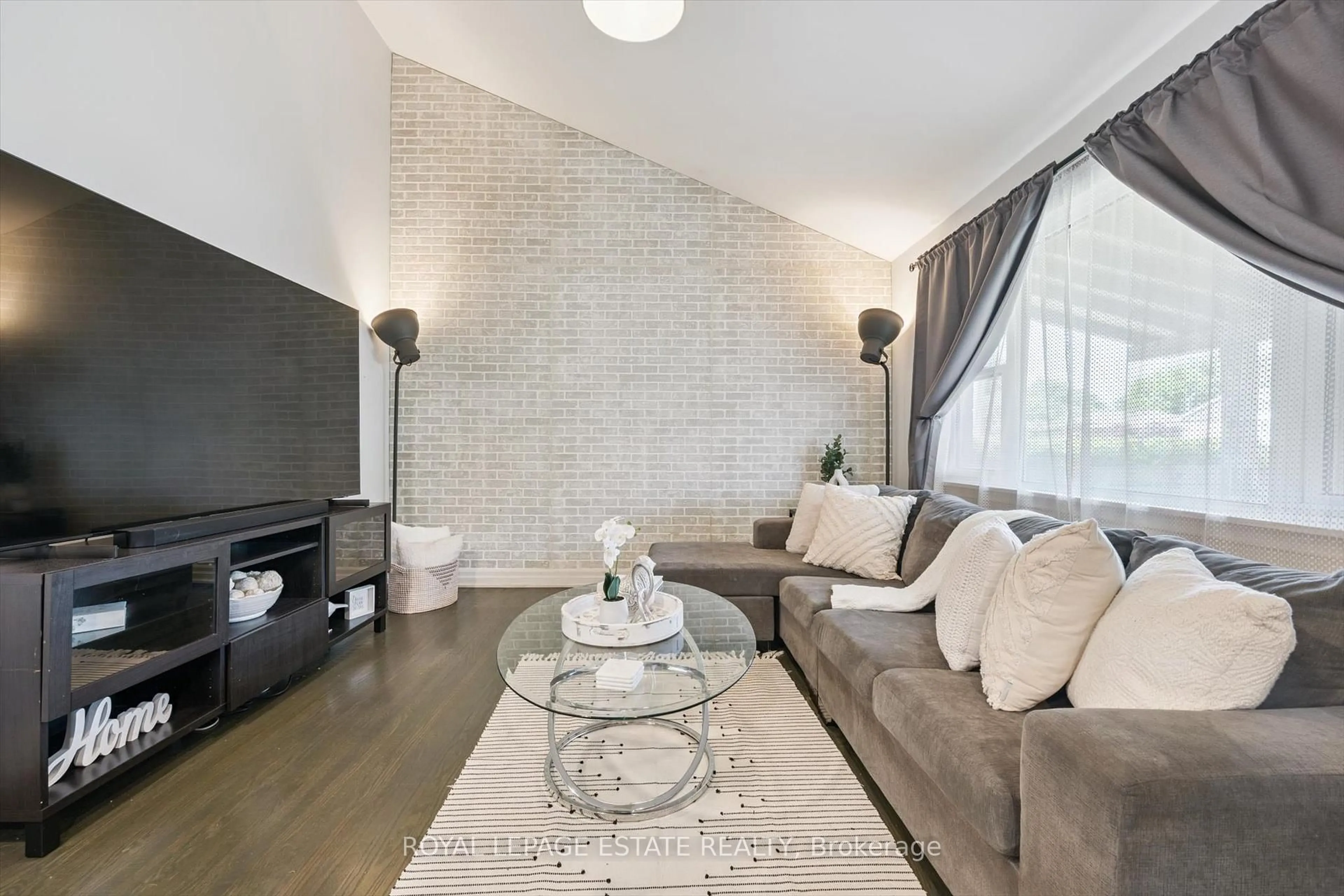 Living room with furniture, unknown for 57 Nanwood Dr, Brampton Ontario L6W 1M1