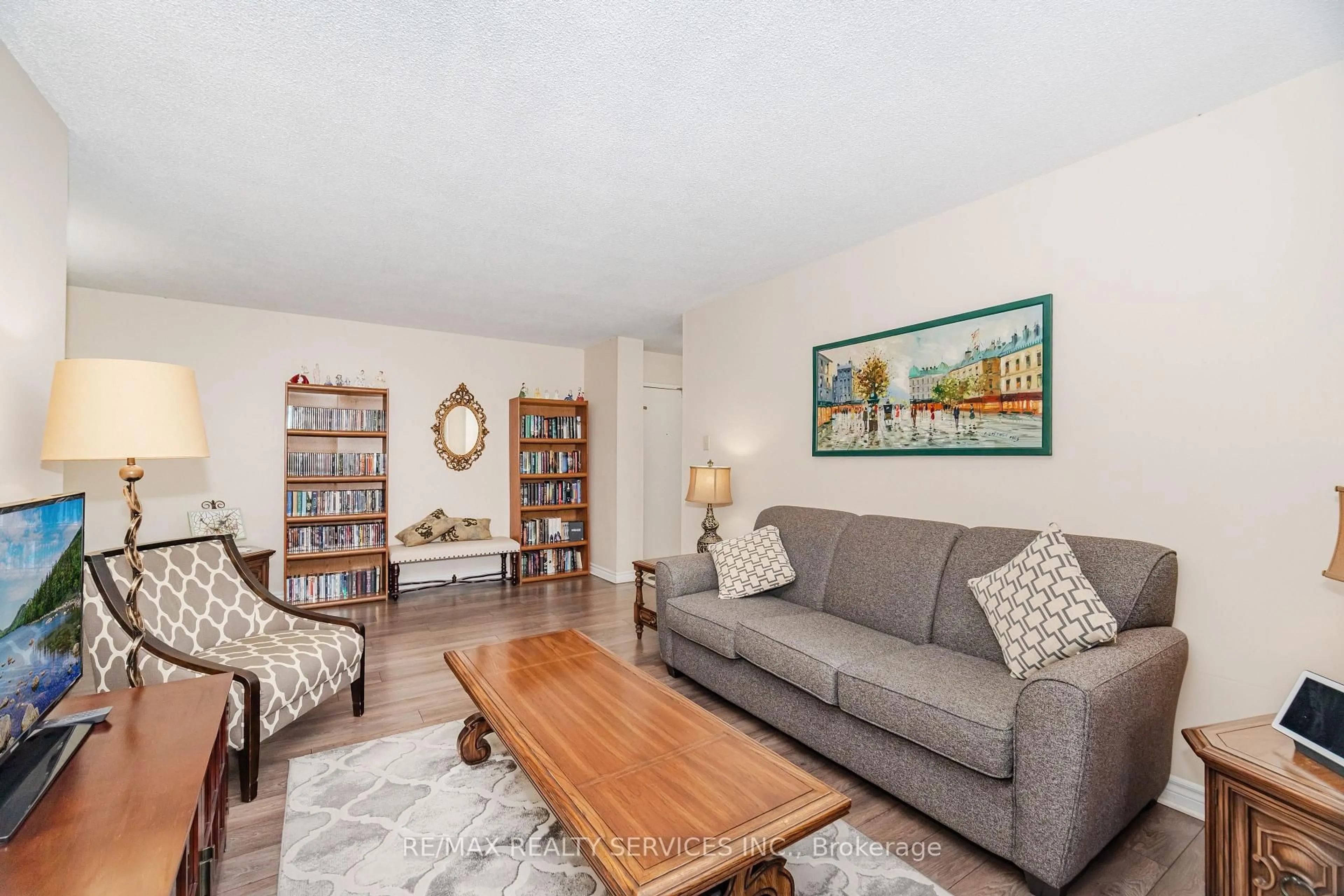 Living room with furniture, unknown for 3 Lisa St #108, Brampton Ontario L6T 4A2