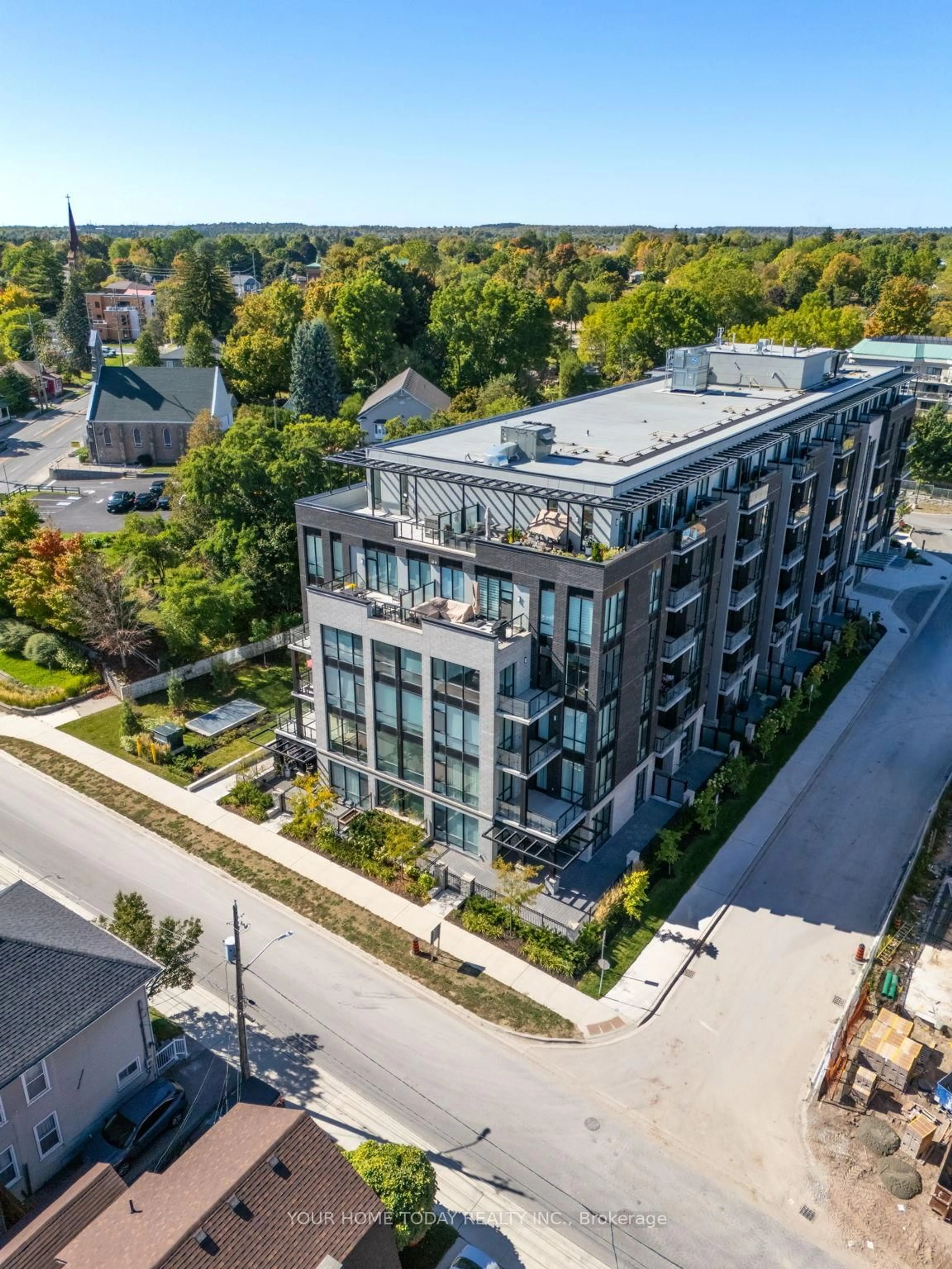 A pic from outside/outdoor area/front of a property/back of a property/a pic from drone, unknown for 42 Mill St #610, Halton Hills Ontario L7G 0P9