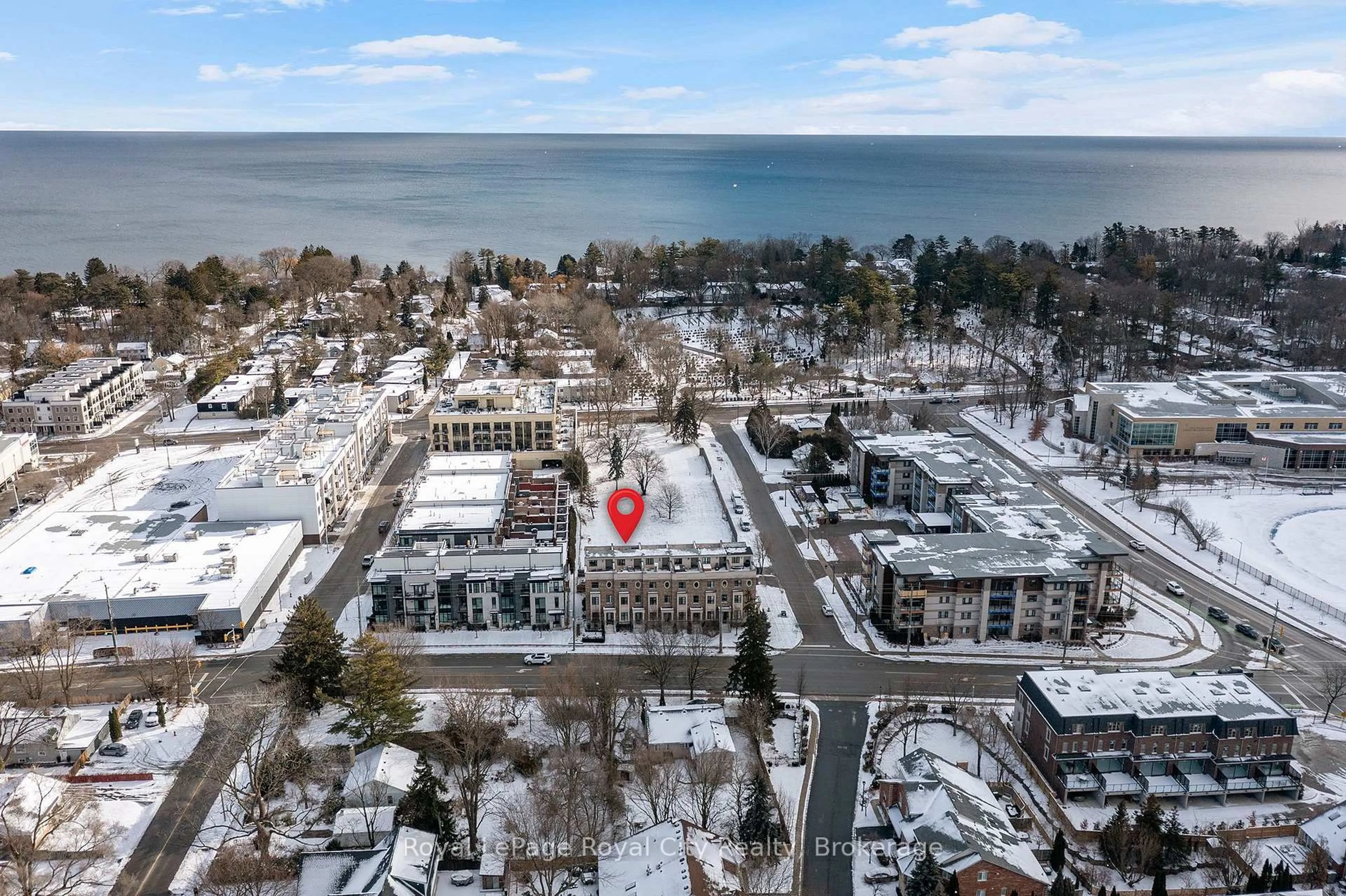 A pic from outside/outdoor area/front of a property/back of a property/a pic from drone, water/lake/river/ocean view for 216 Rebecca St, Oakville Ontario L6K 1J9