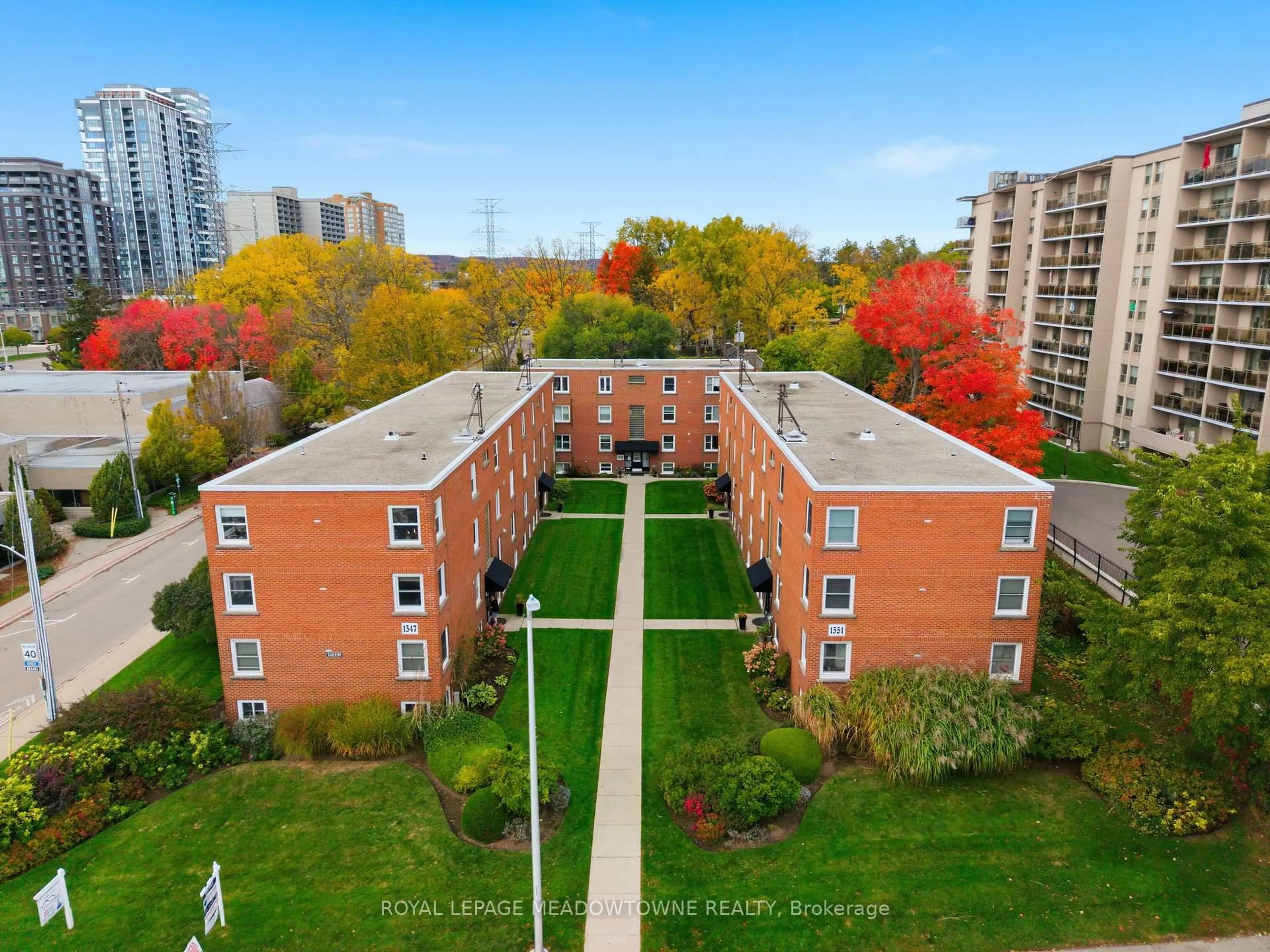 A pic from outside/outdoor area/front of a property/back of a property/a pic from drone, city buildings view from balcony for 1351 Lakeshore Rd #15, Burlington Ontario L7S 1B1