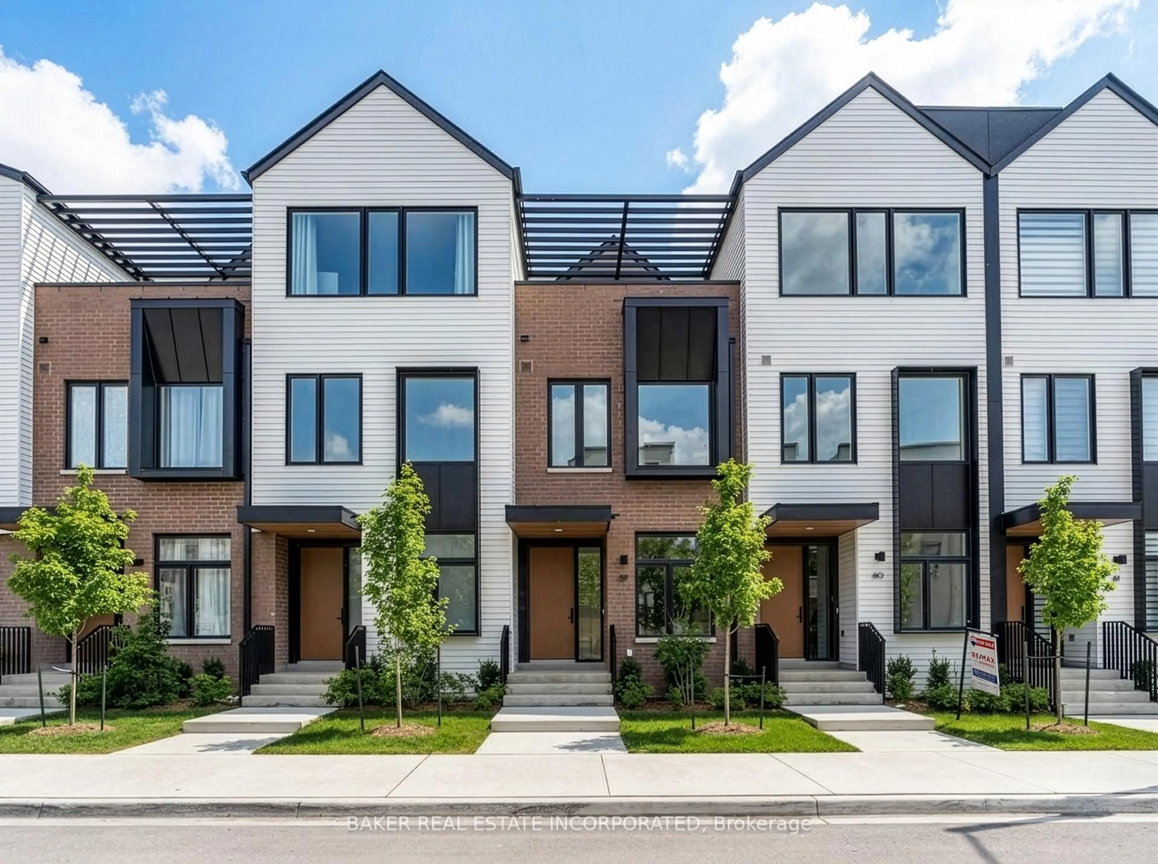 Home with brick exterior material, street for 35 Lou Parsons Way #59, Mississauga Ontario L5H 0B2