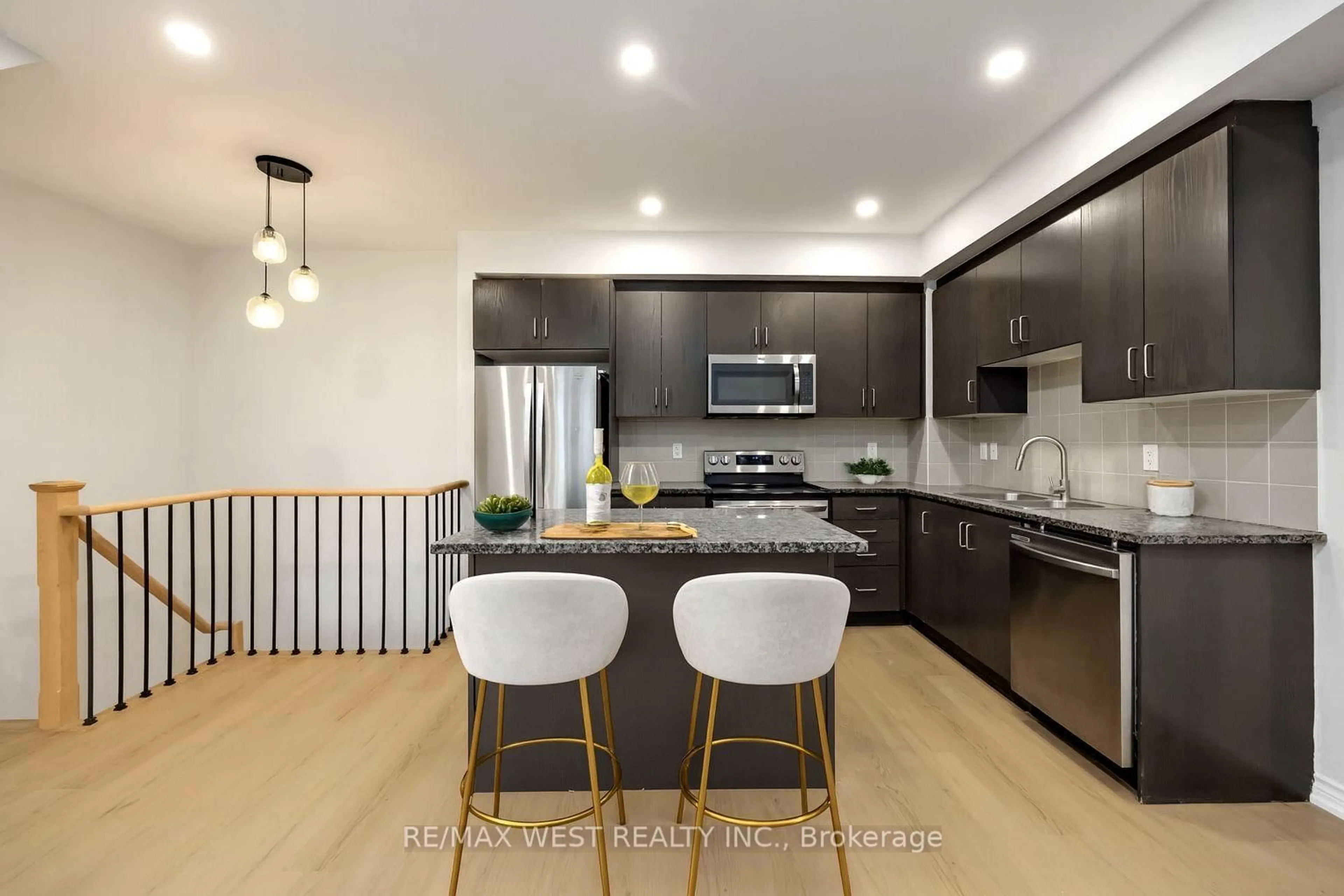 Open concept kitchen, unknown for 11 Applewood Lane #120, Toronto Ontario M9C 0C1