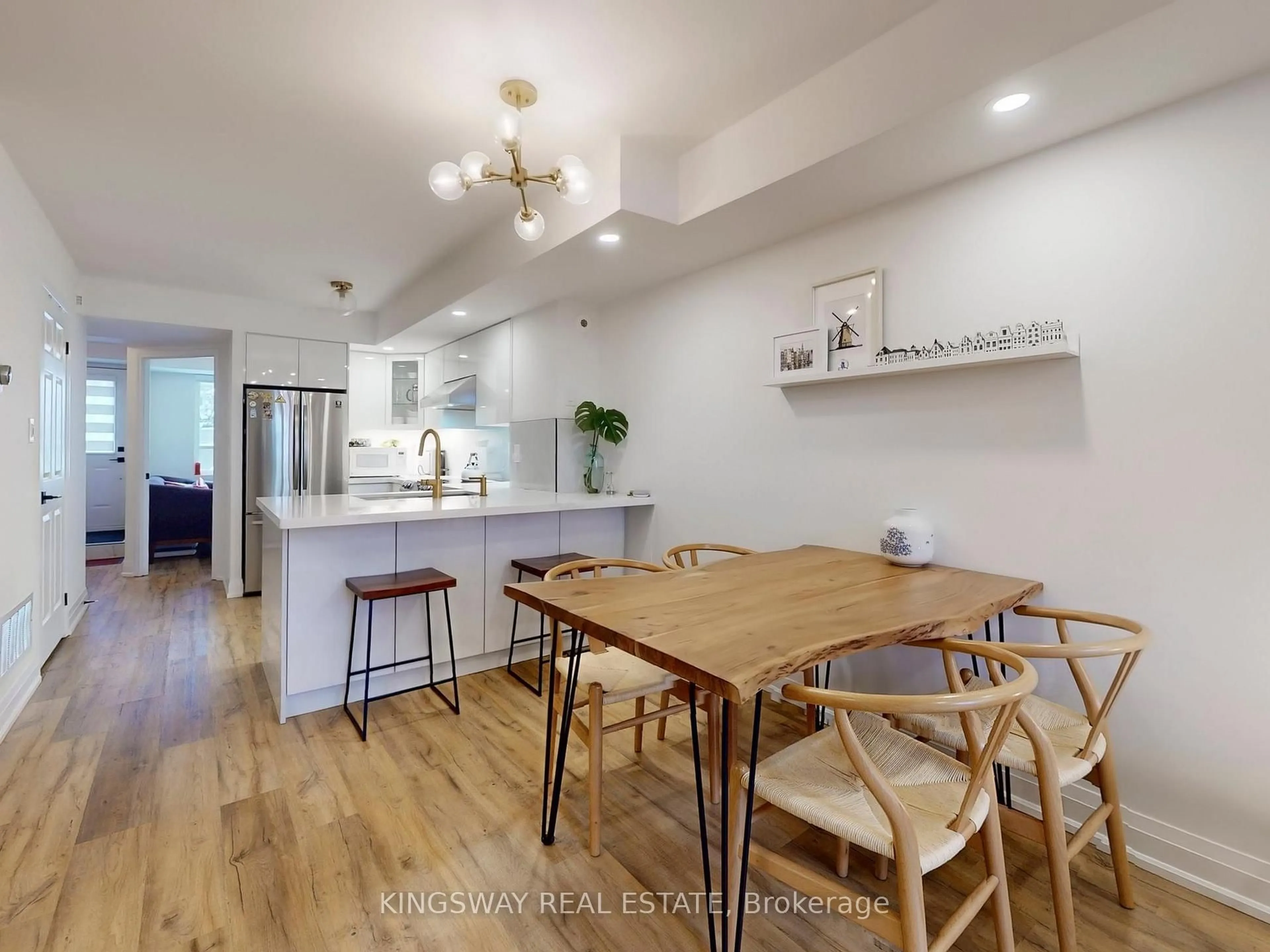 Open concept kitchen, wood/laminate floor for 351 Wallace Ave #163, Toronto Ontario M6P 3N1