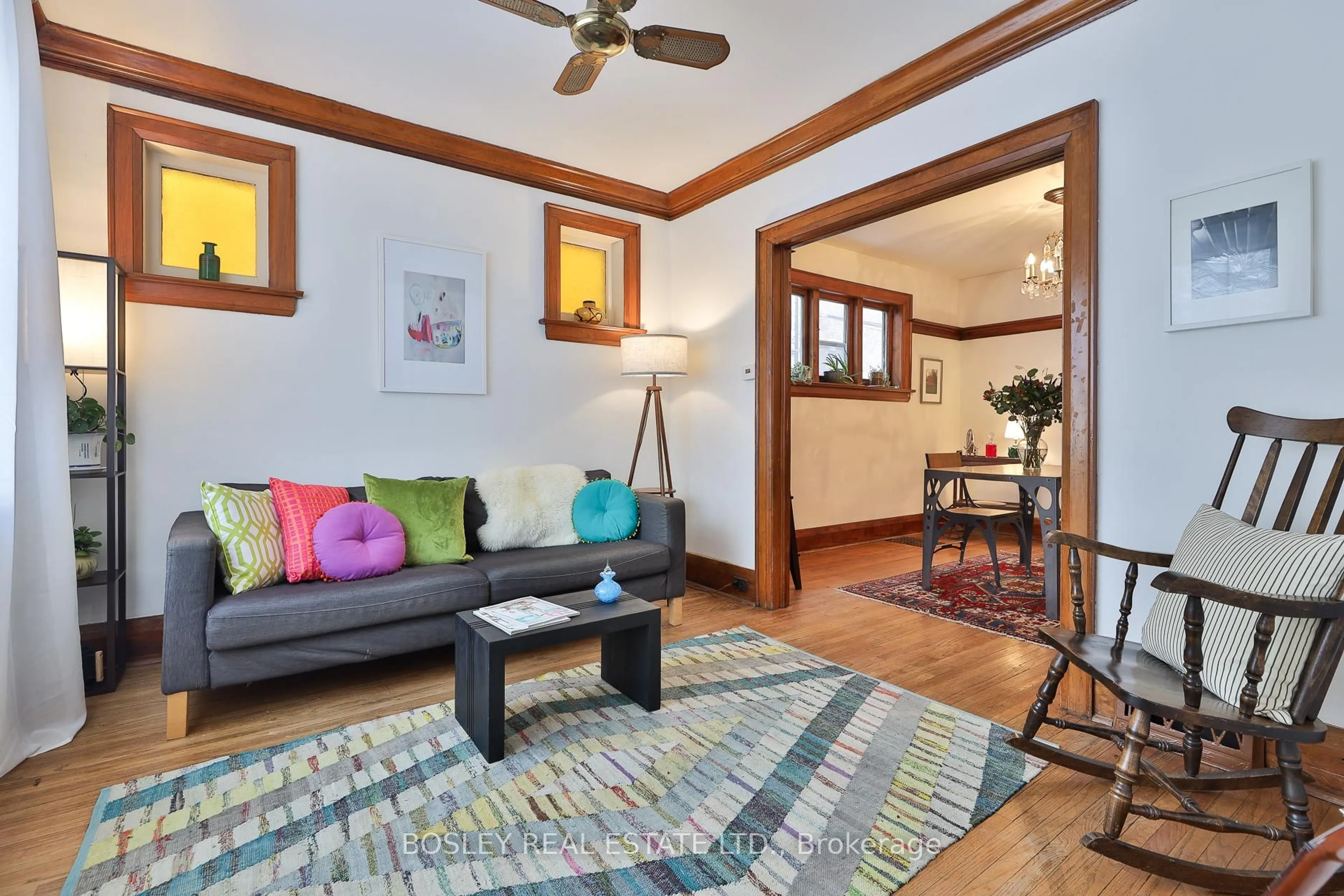 Living room with furniture, wood/laminate floor for 224 Rosethorn Ave, Toronto Ontario M6M 3L1