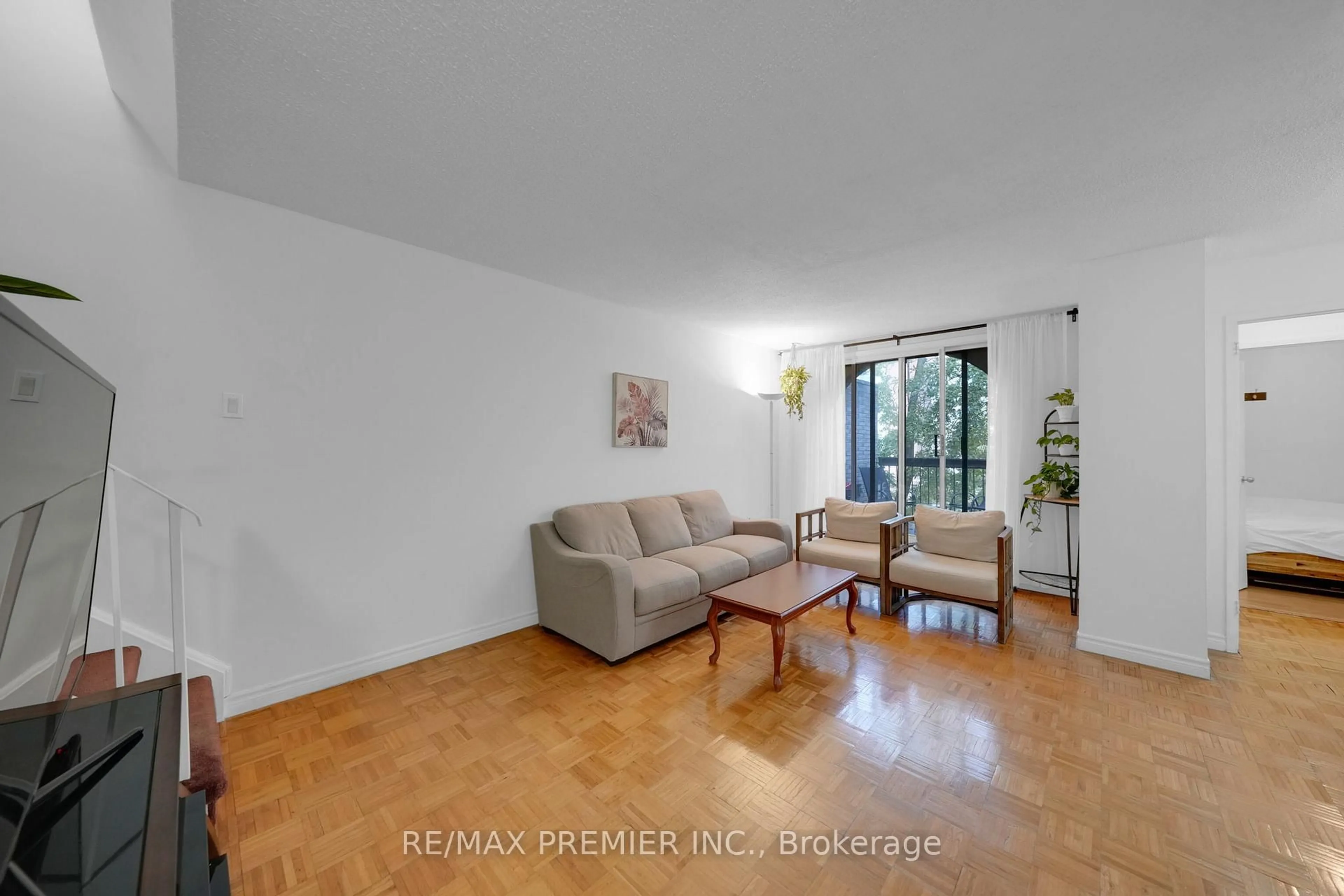 Living room with furniture, unknown for 2095 Roche Crt #209, Mississauga Ontario L5K 2C8