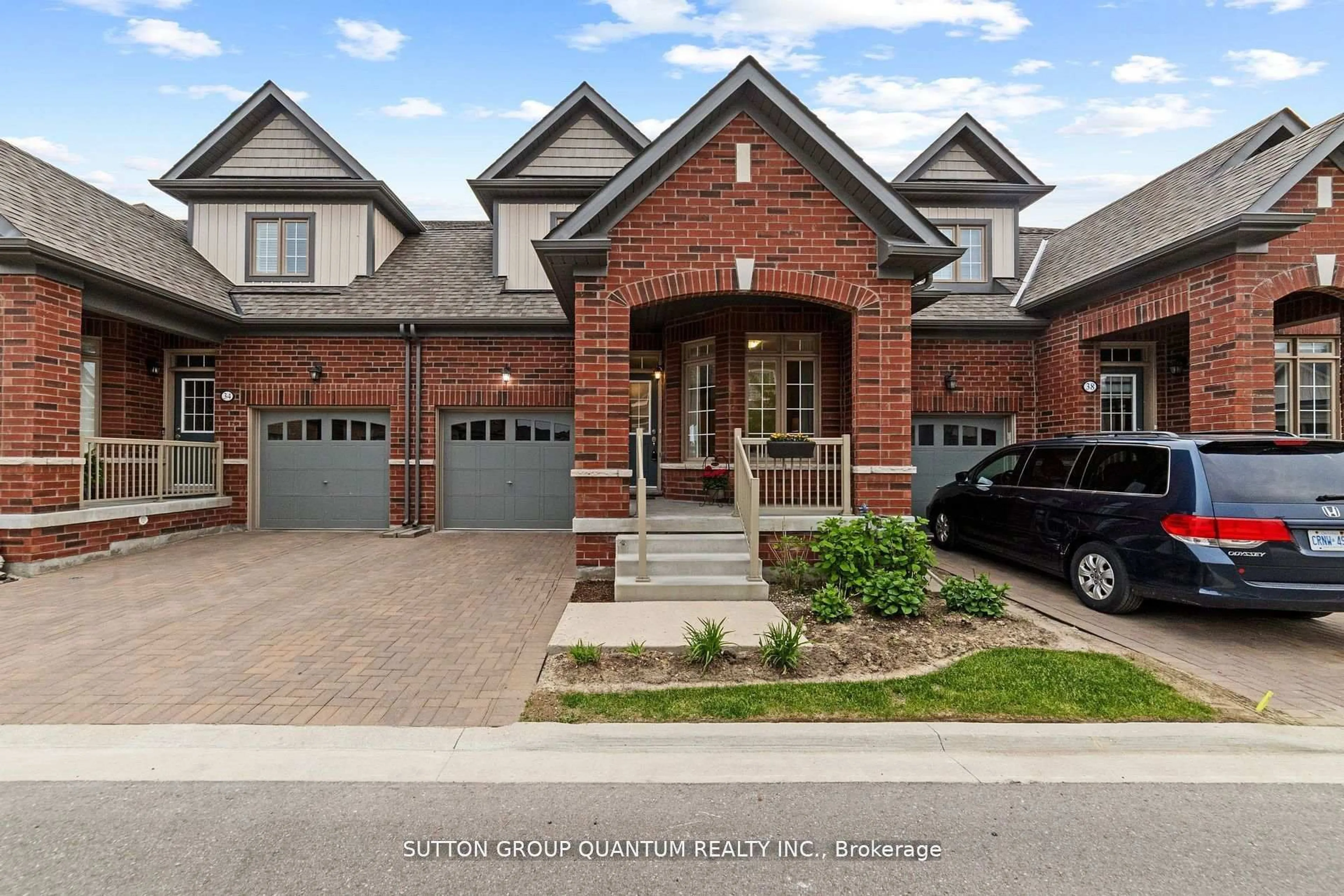 Home with brick exterior material, street for 36 Bluestone Cres, Brampton Ontario M5A 1E7