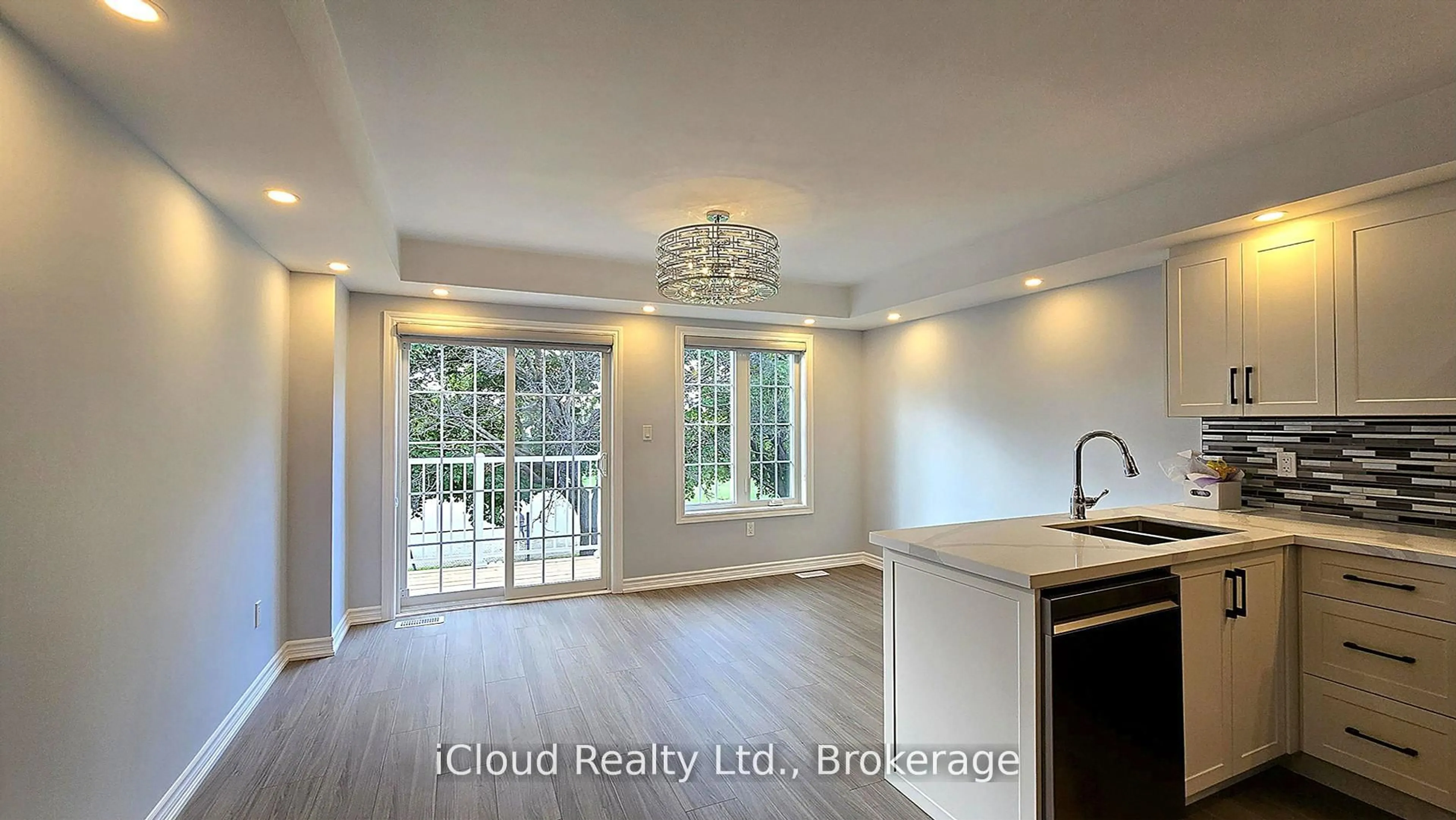 Open concept kitchen, wood/laminate floor for 43 Mantello Dr, Toronto Ontario M3J 0H6