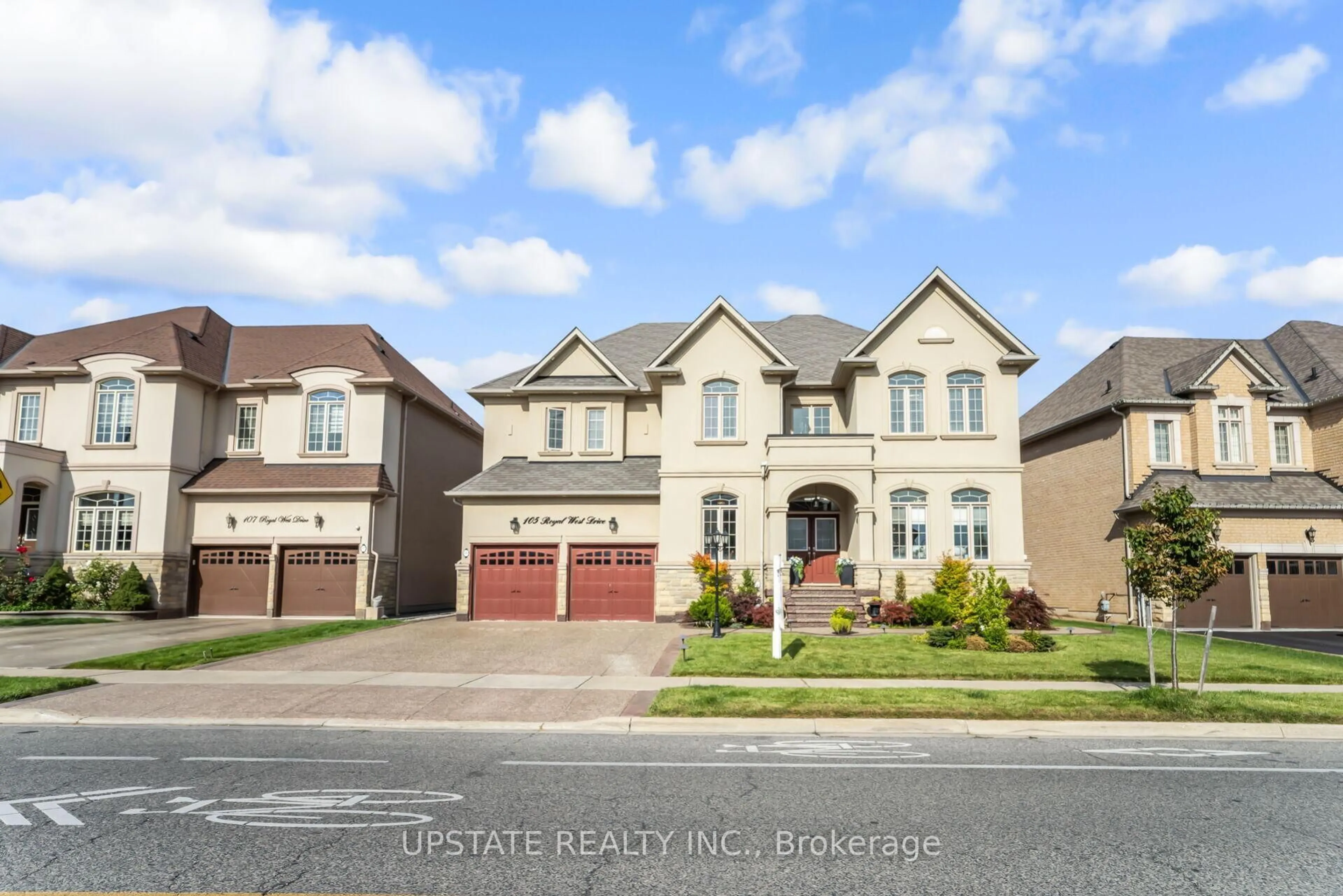 Home with brick exterior material, street for 105 Royal West Dr, Brampton Ontario L6X 0V6