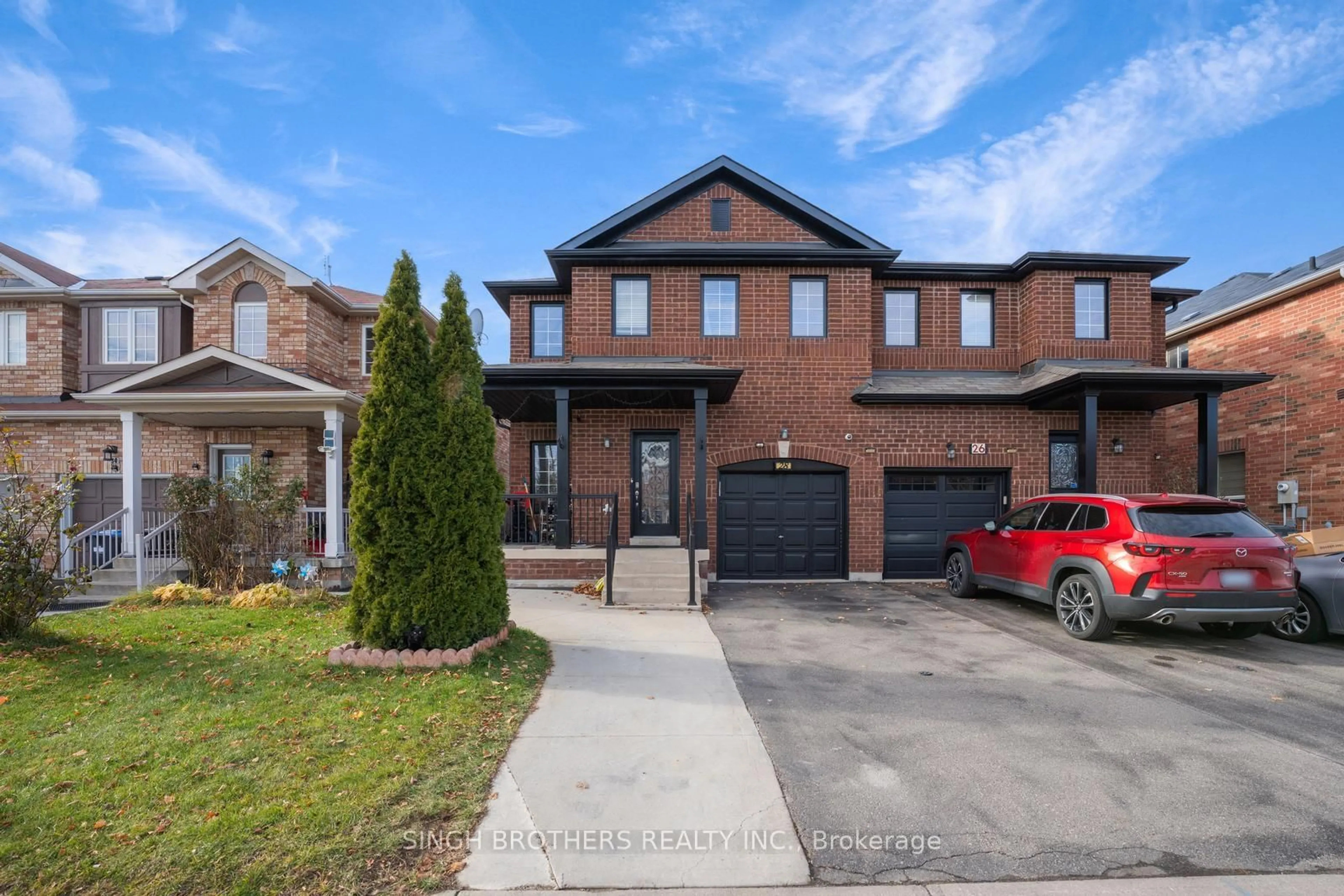Home with brick exterior material, street for 28 Jordensen Dr, Brampton Ontario L6X 0T2