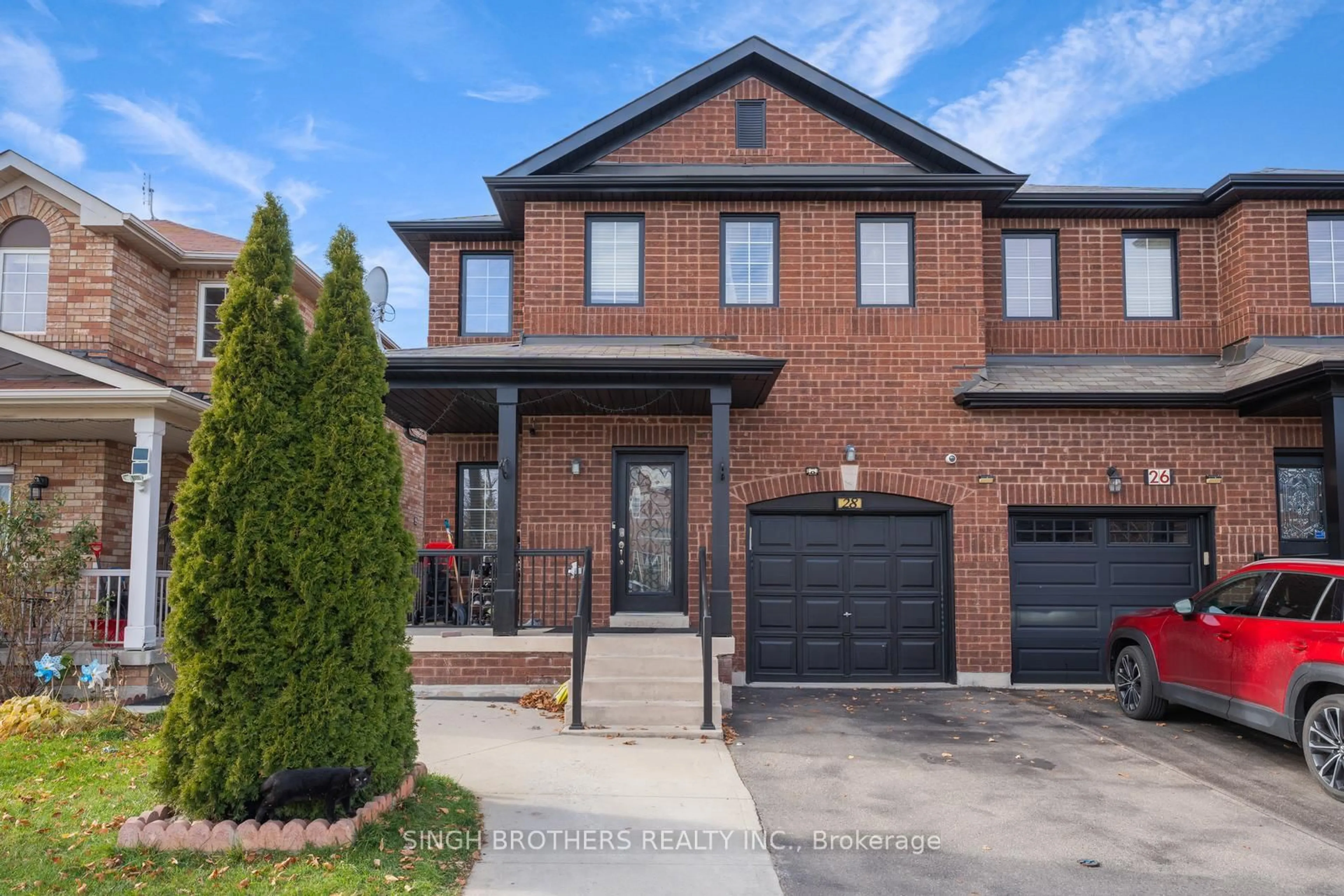 Home with brick exterior material, street for 28 Jordensen Dr, Brampton Ontario L6X 0T2