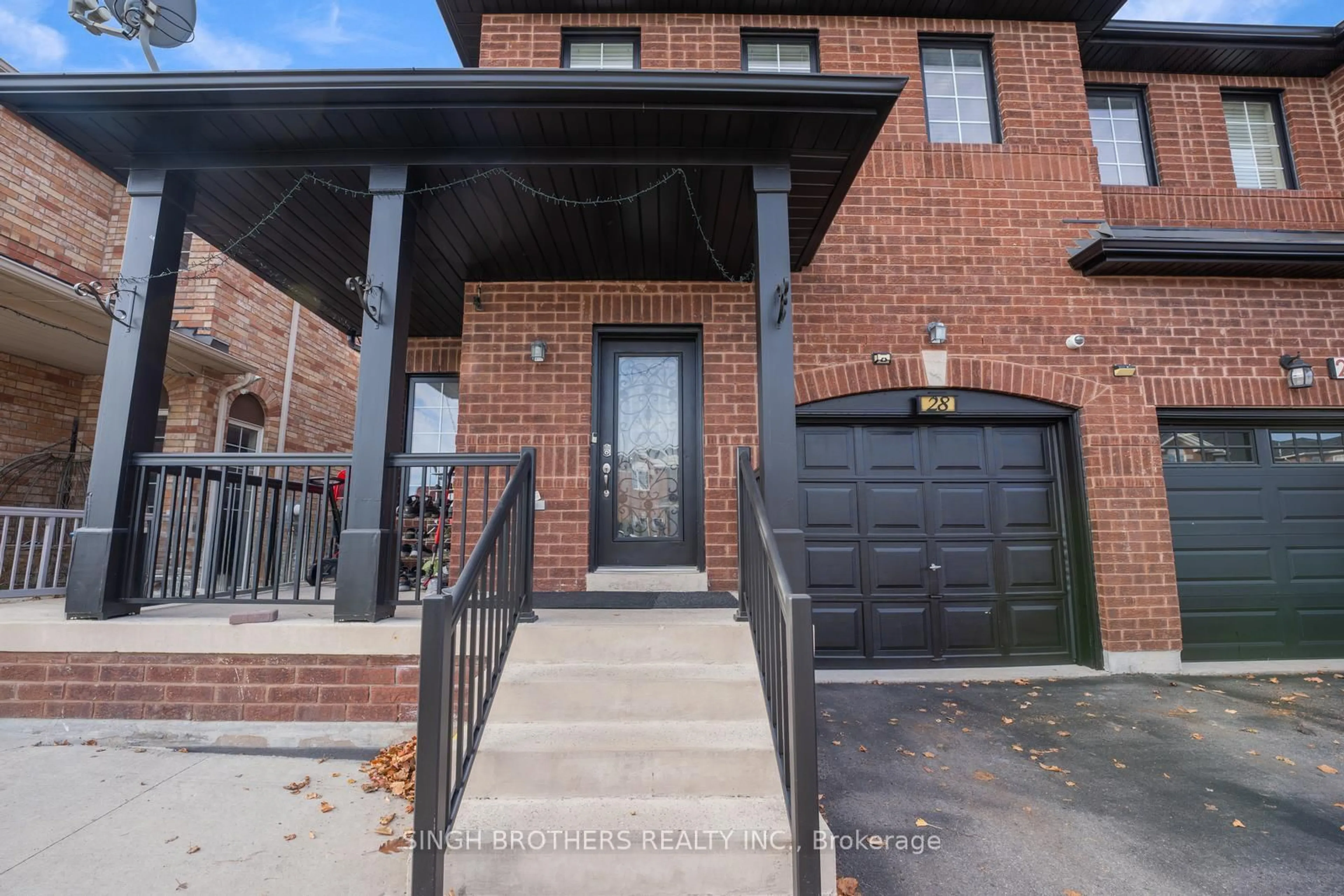 Home with brick exterior material, street for 28 Jordensen Dr, Brampton Ontario L6X 0T2