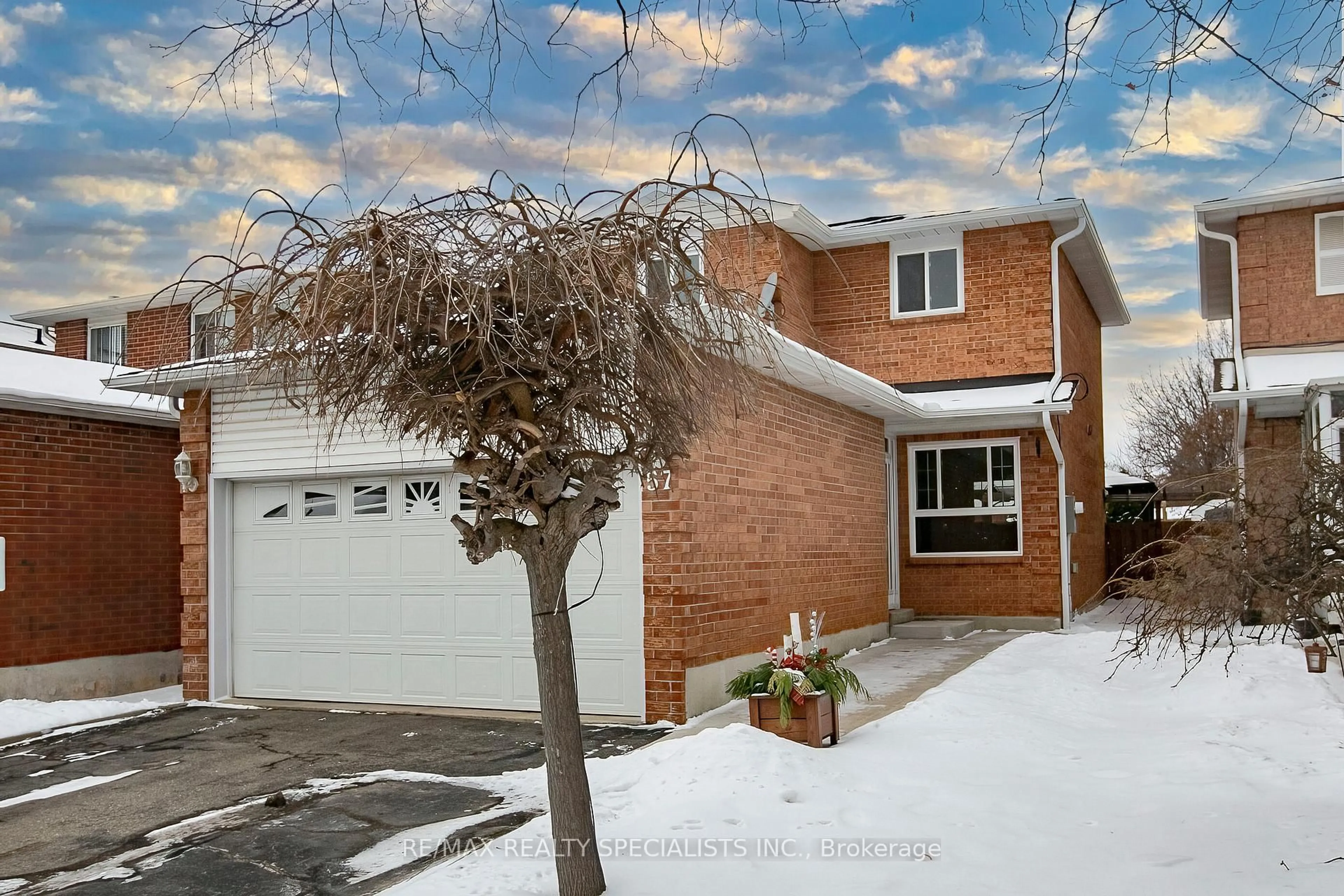 Home with brick exterior material, street for 57 Ecclestone Dr, Brampton Ontario L6X 3N2